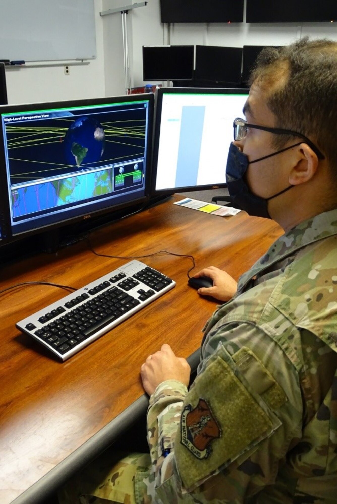 Photo of airman training at a computer