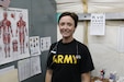 U.S. Army Capt. Christina Broomell, physician assistant with the 28th Expeditionary Combat Aviation Brigade, poses for a photo at a medical center in the 28th ECAB's area of operations in the Middle East.