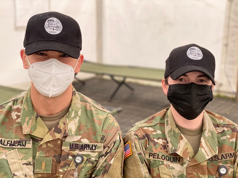 Army 2nd Lt. Ryan Alfalaij is the COVID-19 isolation facility officer in charge at Ämaria Air Base, and Capt. Abigail Peloquin is the base operations support officer in charge at the air base.  If a Soldier participating in DEFENDER-Europe 21 in Estonia starts feeling ill and is exhibiting signs and symptoms of COVID-19 – he or she will meet these two Army officers very quickly.