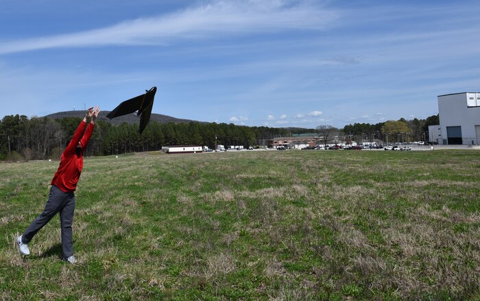 Will Shuart, Corps of Engineers’ Engineering Research and Development Center’s Geospatial Research Laboratory geographer, hand launches a Sensfly  eBee X Unmanned Aircraft System at Redstone Arsenal, Alabama, March 22. The UAS's sensor payload taks three images every 50 feet, gathering data and allowing for a three -dimensional “image map” for the Army.