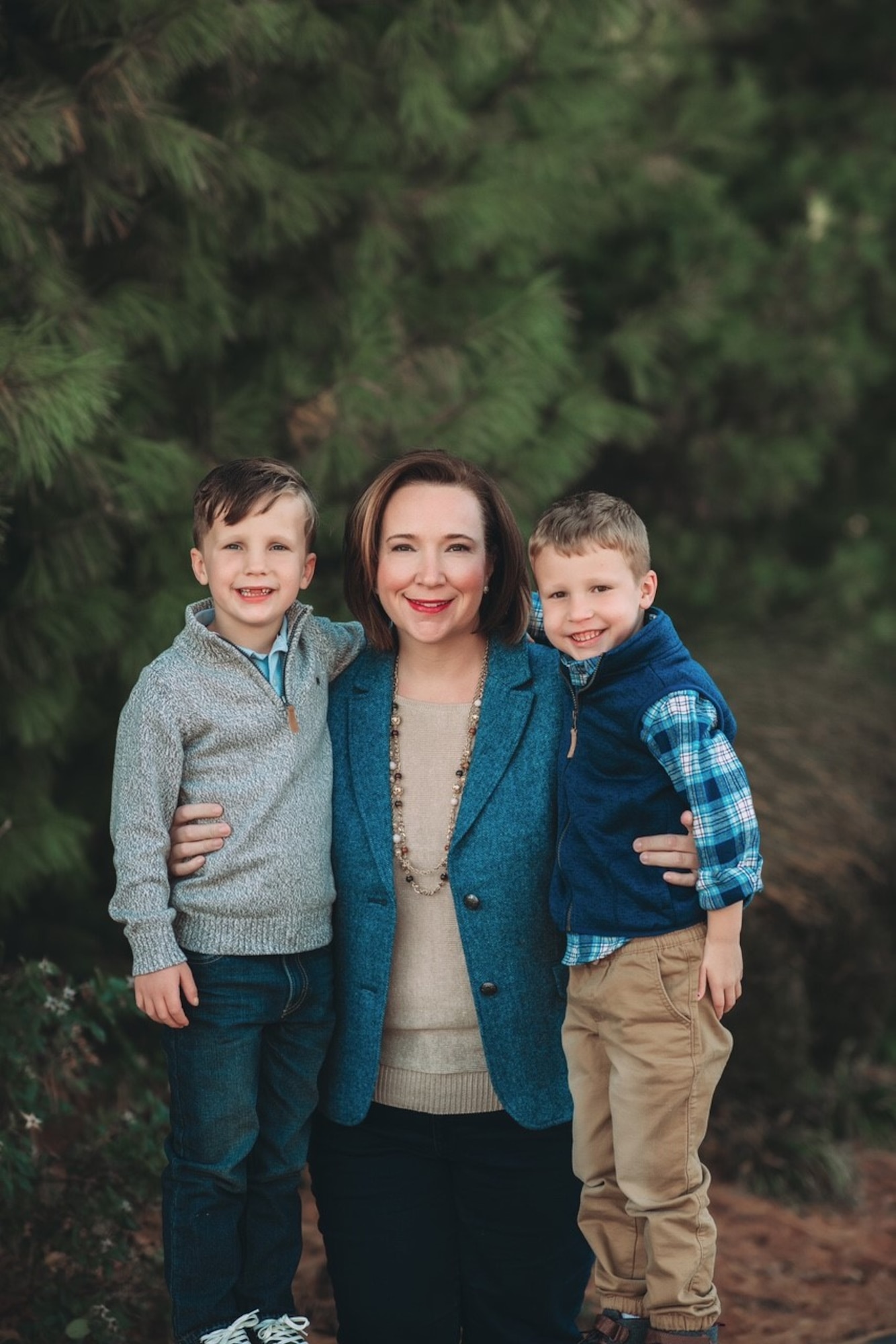 Jennifer Morgan,  the Deputy Program Executive Officer for Bombers with sons Thomas (left), and Grayson (right), both seven years old.