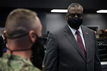 Secretary of Defense Lloyd J. Austin III is briefed by a Cyber National Mission Force member on full-spectrum cyber operations during his visit to U.S. Cyber Command, at Fort George G. Meade, Md., April 27, 2021.
