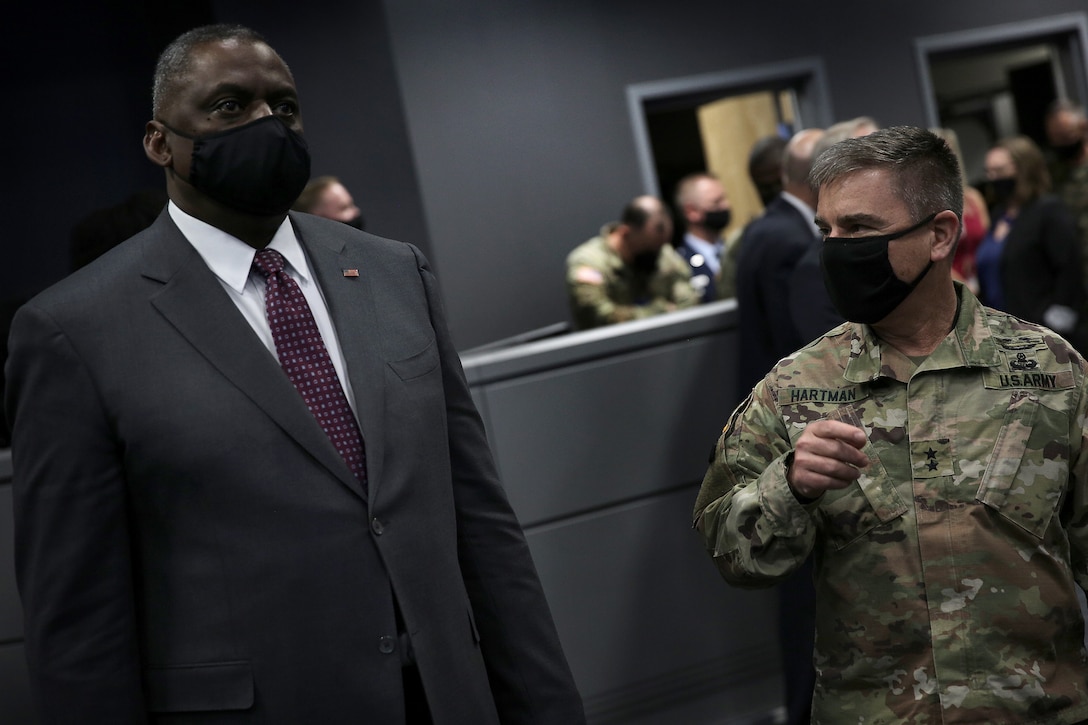 Secretary of Defense Lloyd J. Austin III is briefed by Maj. Gen. William J. Hartman, Cyber National Mission Force commander, on full-spectrum cyber operations during his visit to U.S. Cyber Command, at Fort George G. Meade, Md., April 27, 2021.