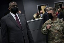 Secretary of Defense Lloyd J. Austin III is briefed by Maj. Gen. William J. Hartman, Cyber National Mission Force commander, on full-spectrum cyber operations during his visit to U.S. Cyber Command, at Fort George G. Meade, Md., April 27, 2021.