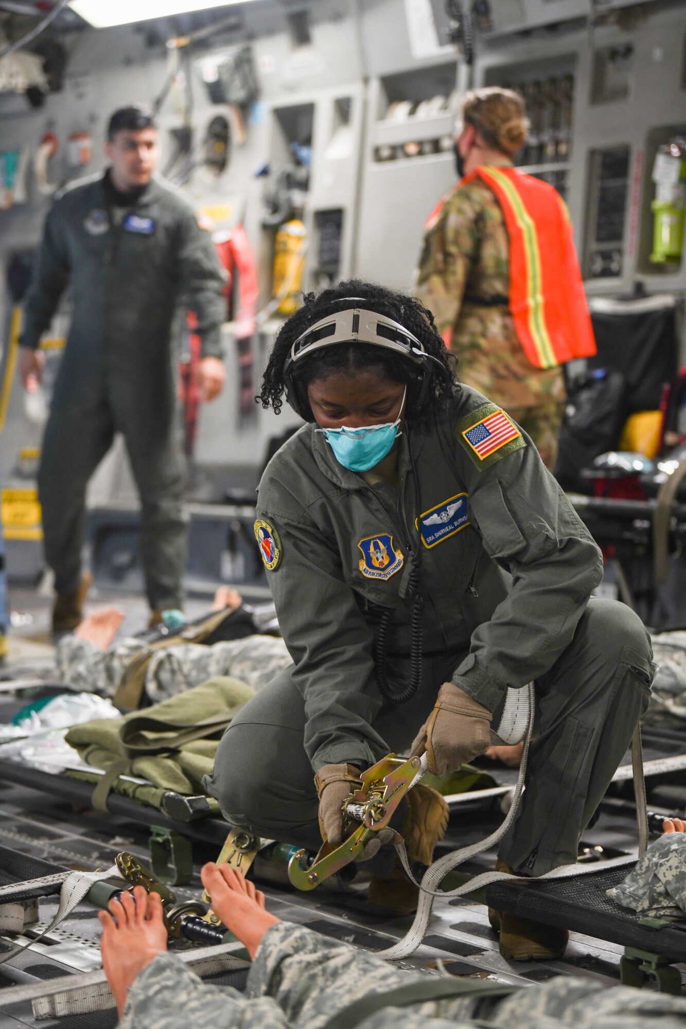 Senior Shirneal Burnside, 445th Aeromedical Evacuation Squadron, secures the litter of patients on a 445th Airlift Wing C-17 Globemaster III during the Ultimate Caduceus training exercise April 29, 2021. U.S. Transportation Command (USTRANSCOM) began a week-long aeromedical and global patient movement exercise, Ultimate Caduceus, April 26. Approximately 250 personnel including members of the 445th Airlift Wing and the 88th Air Base Wing participated in the field training exercise. (U.S. Air Force photo//Master Sgt. Patrick O’Reilly)