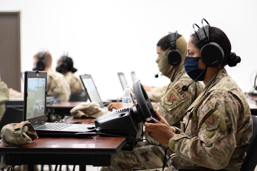 Airmen running virtual simulation training