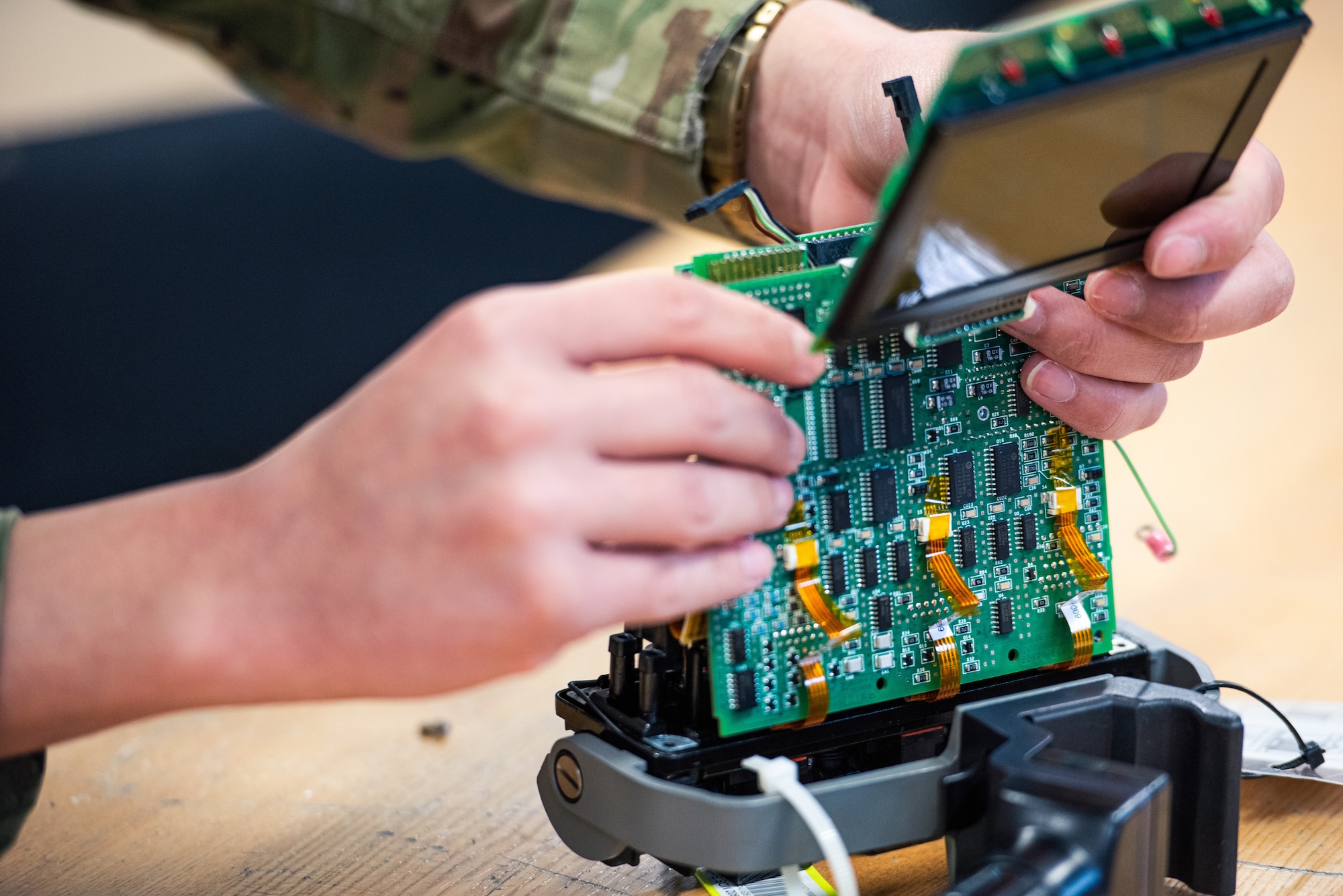 U.S. Air Force Airman 1st Class Eric Perez-Solano, 375th Medical Support Squadron biomedical equipment technician, repairs a piece of medical equipment at Scott Air Force Base, Illinois, April 23, 2021. Airmen at the Medical Equipment Repair Center are on call to repair lifesaving medical equipment and ensure clinics are able to continue patient care. (U.S. Air Force photo by Airman 1st Class Isaac Olivera)