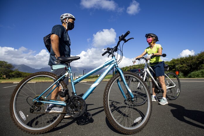 Bicyclists prepare to take part in the Mokapu Cultural Sites Bike Tour, Marine Corps Base Hawaii, April 23, 2021. MCBH Cultural Resource Managers, June Cleghorn and Arleen Garcia-Herbst, led a tour while informing participants of the protected cultural sites and historic significance of the MCBH Mokapu Peninsula. (U.S. Marine Corps photo by Lance Cpl. Samantha Sanchez)