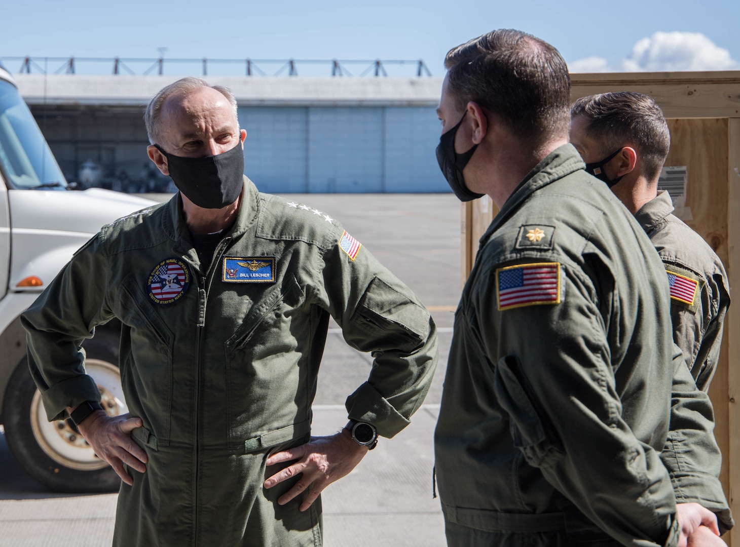 Admiral Bill Lescher, Vice Chief of Naval Operations, talks with leadership from Patrol Squadron (VP) 1 at Naval Air Station (NAS) Whidbey Island on April 26, 2021.