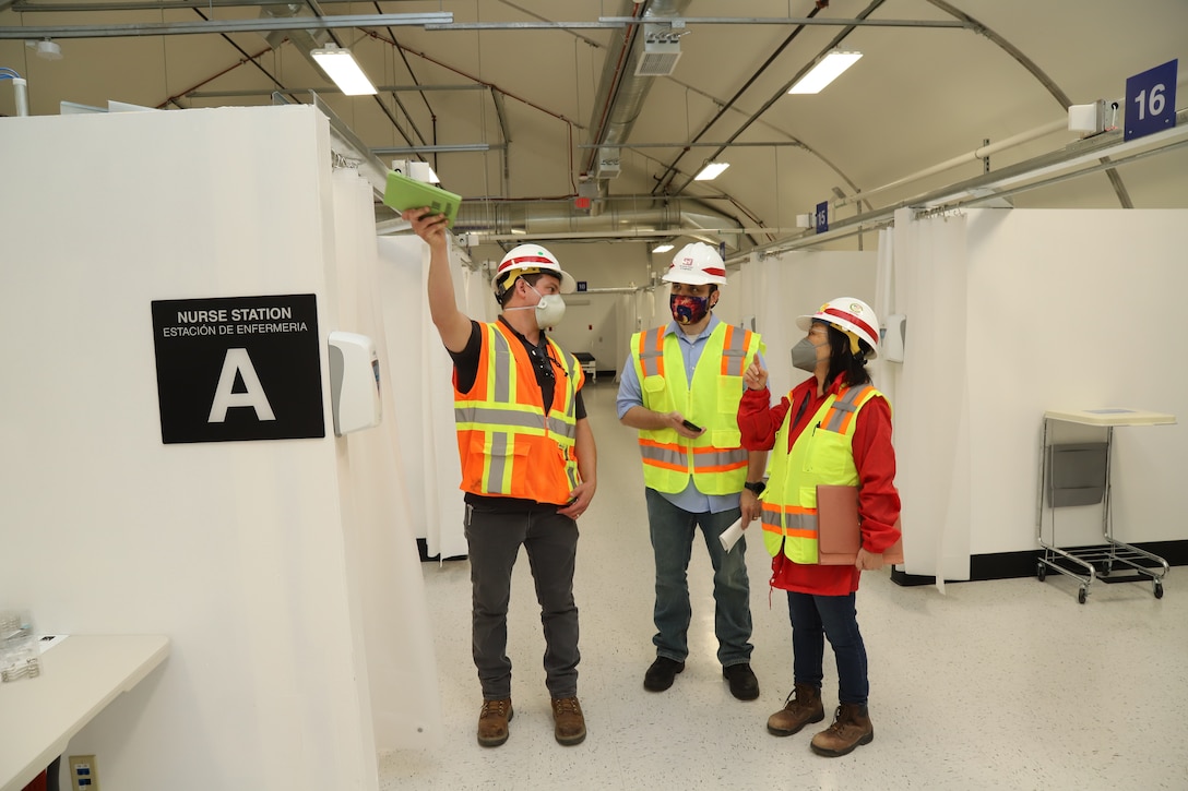 A team that includes subject-matter experts from the U.S. Army Corps of Engineers, the Federal Emergency Management Agency, the California Department of Public Health and the California Governor’s Office of Emergency Services conduct a final inspection of work at Adventist Health White Memorial Medical Center in Boyle Heights, California, April 16, as part of FEMA’s support to California in response to the COVID-19 pandemic.