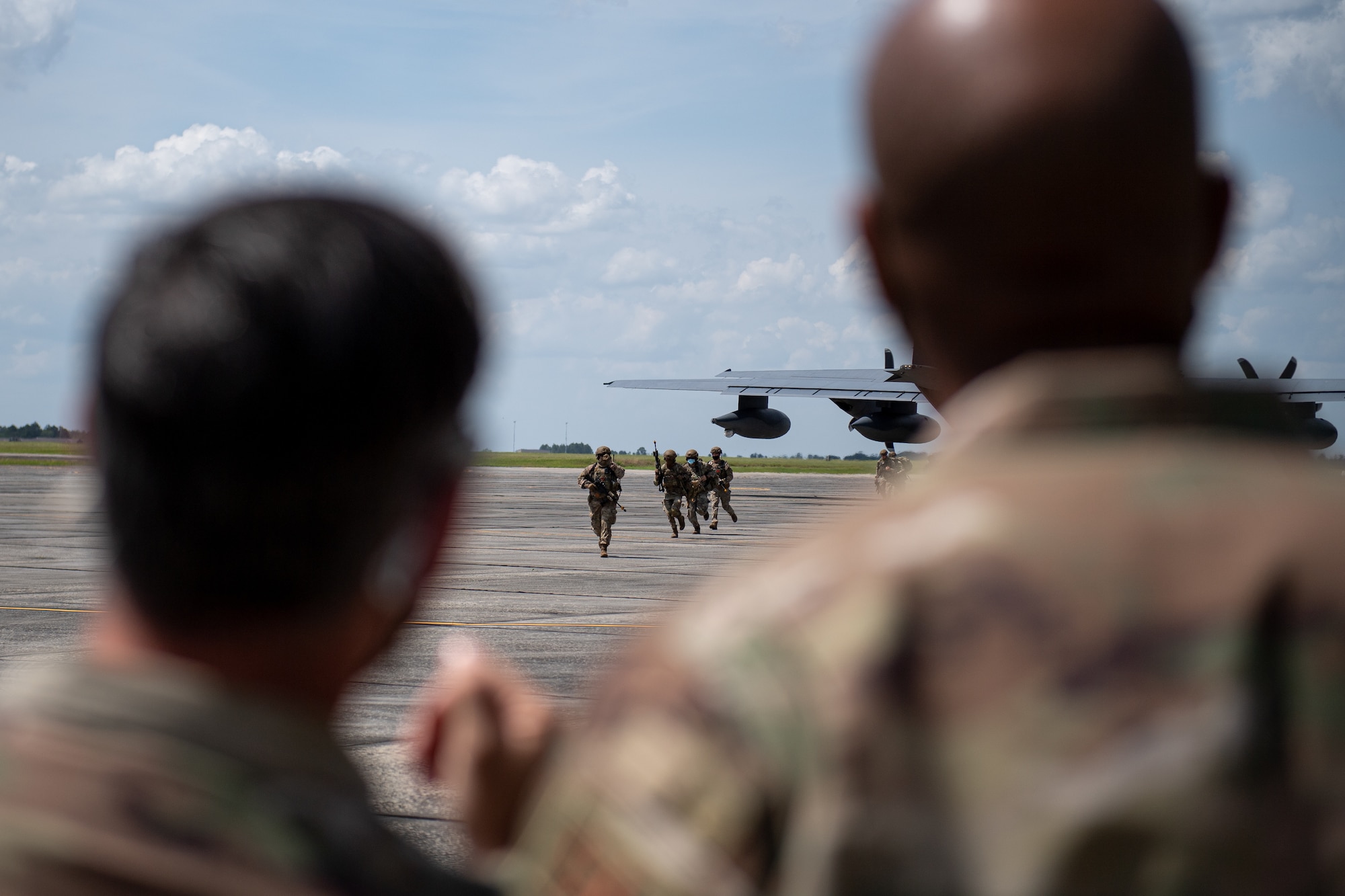 Photo of Airmen observing training