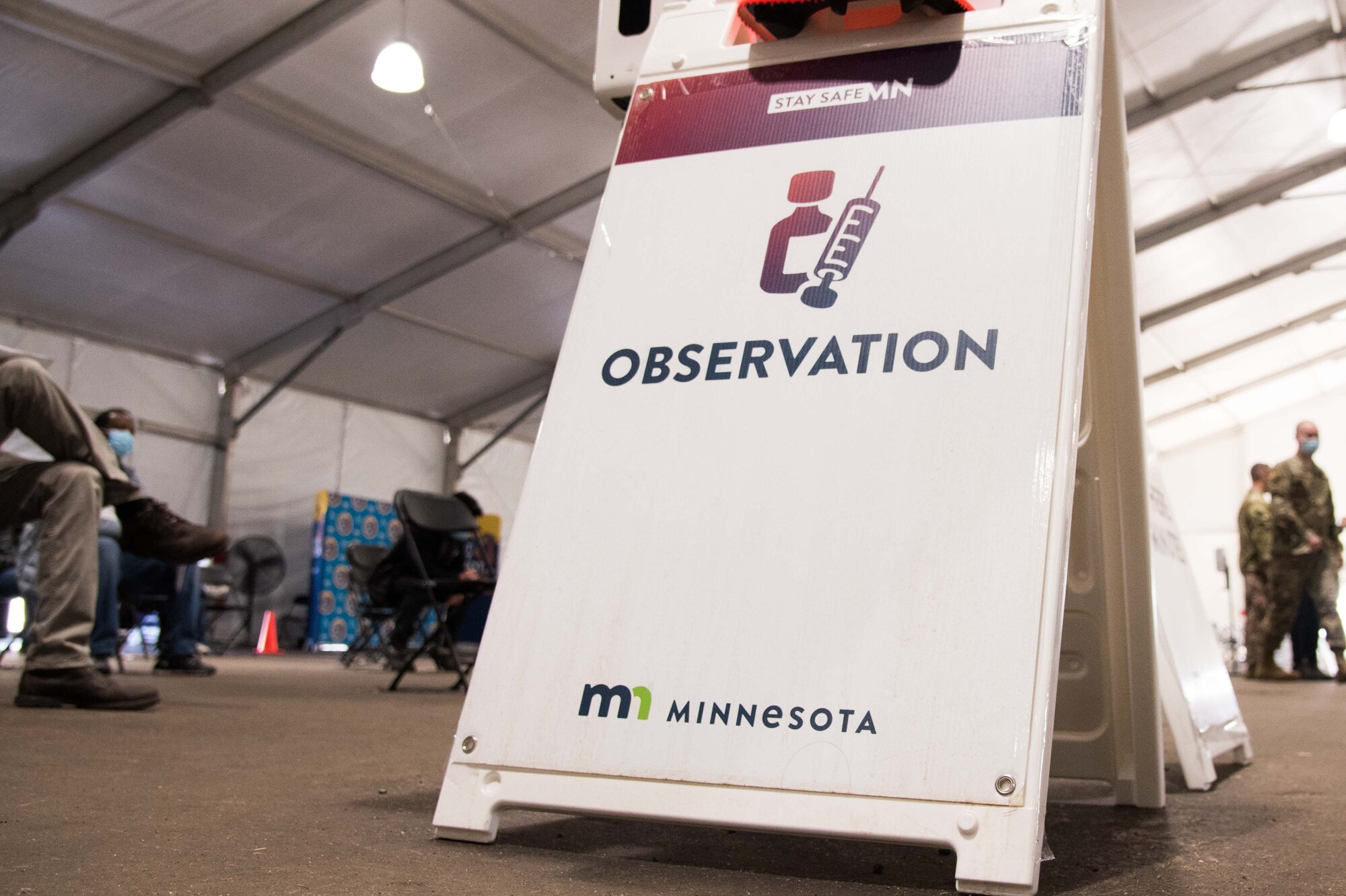 The total-force team uses an observation area to monitor patients after receiving their COVID-19 vaccine April 28, 2021, at the Community Vaccination Center (CVC) in St. Paul,
Minnesota. As of April 28, the Community Vaccination Center has already been able to vaccinate 38,314 community members. (U.S. Air Force photo by Senior Airman Alexi Bosarge)