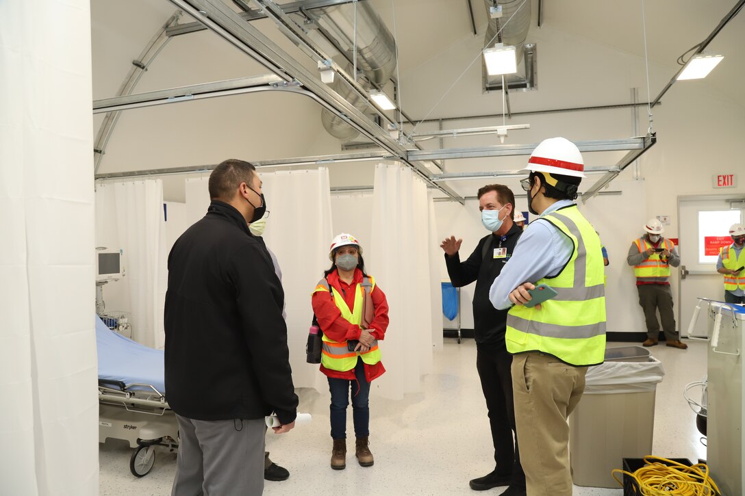 A team that includes subject-matter experts from the U.S. Army Corps of Engineers, the Federal Emergency Management Agency, the California Department of Public Health, Los Angeles Department of Public Works and the California Governor’s Office of Emergency Services conduct a final inspection of work  at Mission Community Hospital, in Panorama City, California, April 22, as part of FEMA’s support to California in response to the COVID-19 pandemic.