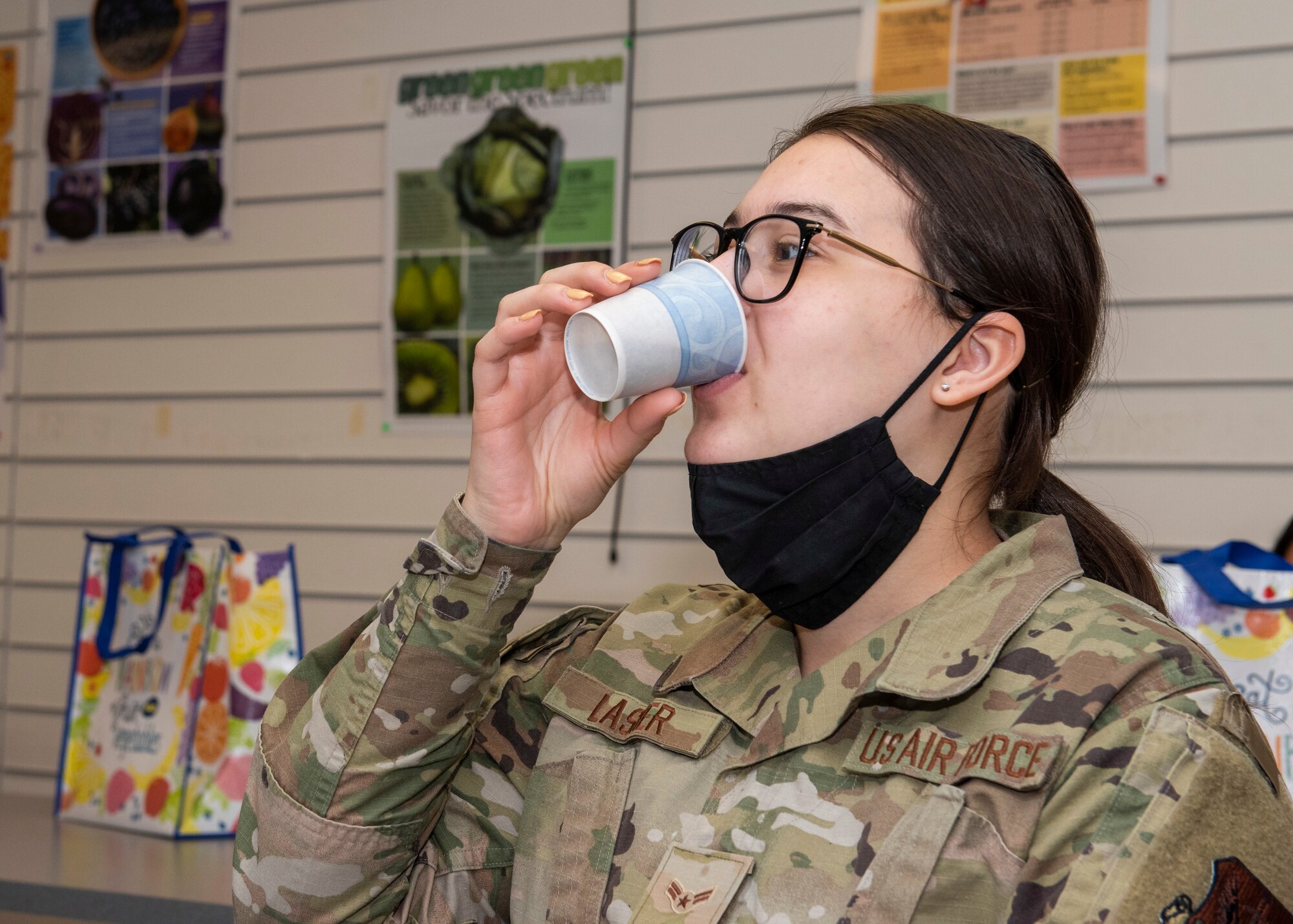 U.S Air Force Airman 1st Class Marissa Lasher, a morse code operator assigned to the 381st Intelligence Squadron, samples a fruit-and-vegetable smoothie during a Health Promotion nutrition class at Joint Base Elmendorf-Richardson, Alaska, April 19, 2021. Health Promotion strives to promote health and wellness for all military members, their dependents, and Department of Defense civilians through community and group events to improve the health, mission readiness and productivity of the military community.