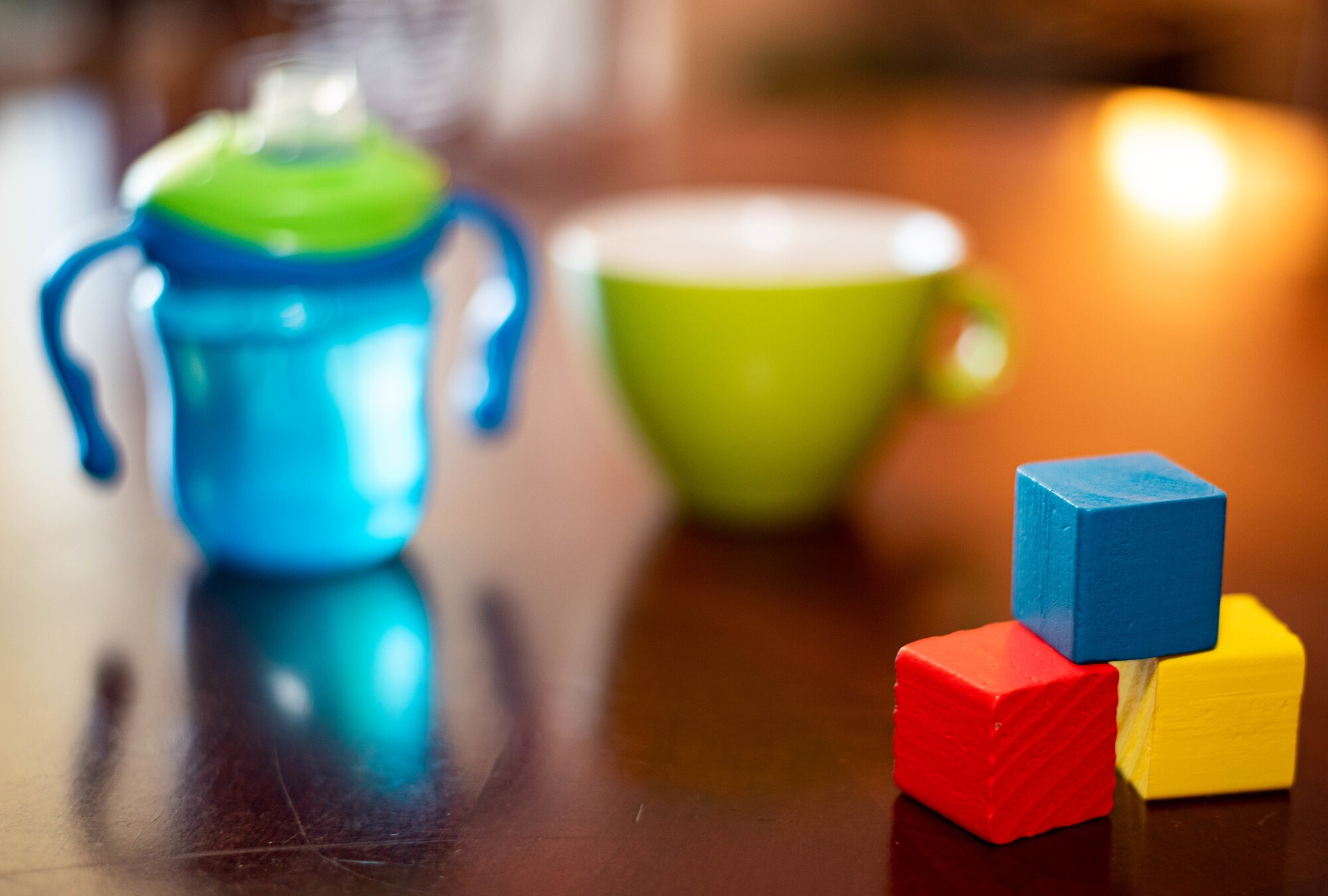 blocks in front of two cups
