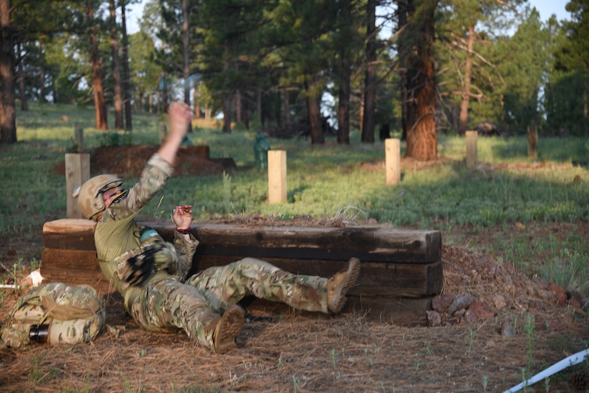 A staff sergeant (name withheld for security) from the 19th Special Forces Group (Airborne) competes in the grenade lanes July 21, 2021, during the U.S. Army National Guard Best Warrior Competition at Camp Navajo Military Reservation, Arizona.