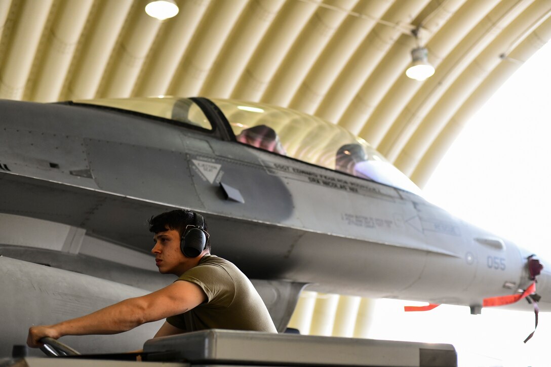 An Airman poses for a portrait.