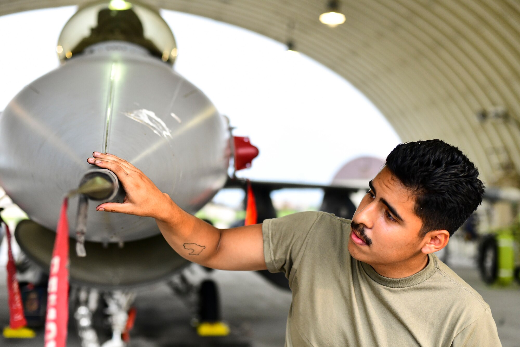 An Airman poses for a portrait.