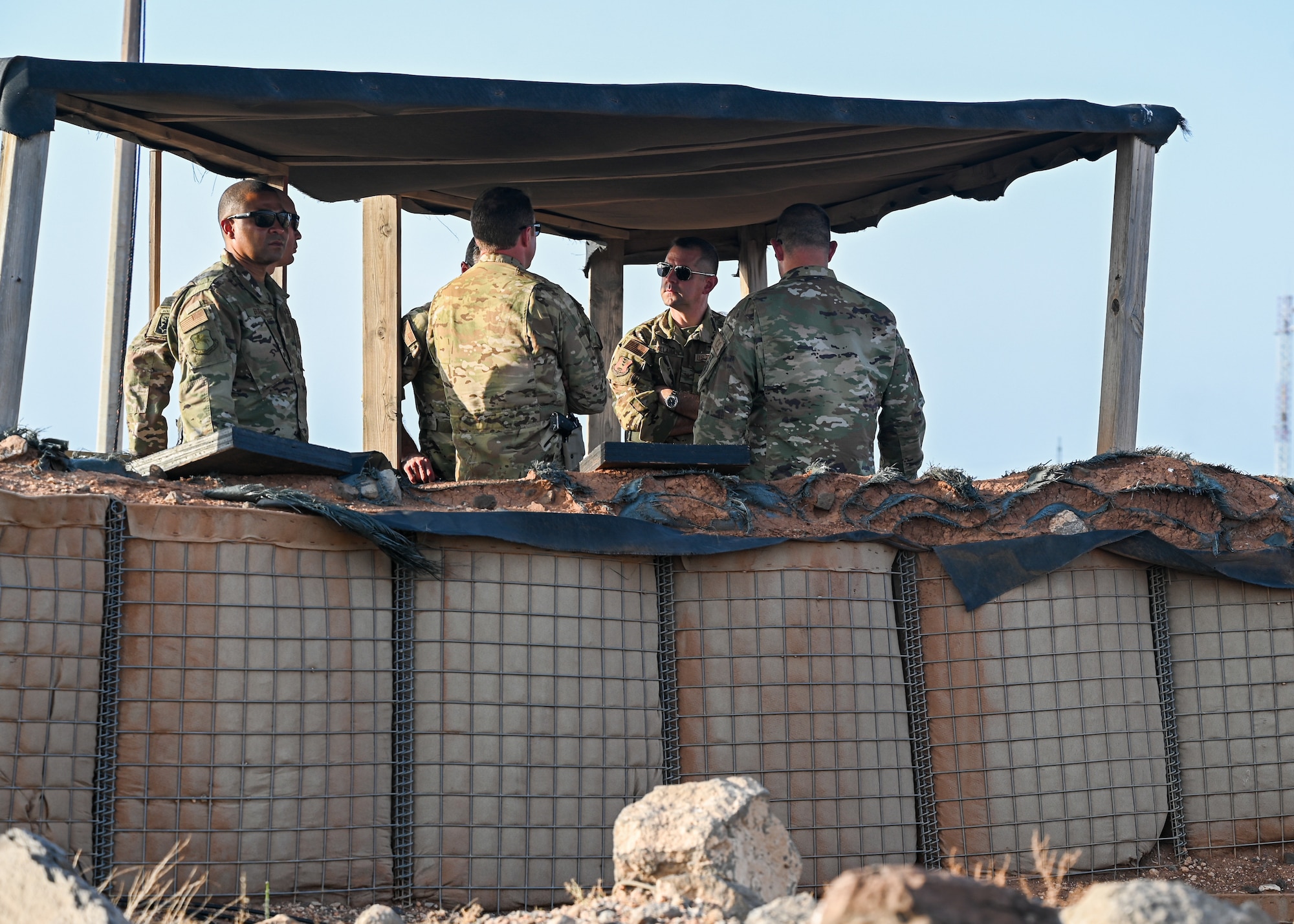 Col. Bryan T. Callahan, 435th Air Expeditionary Wing commander, speaks with leadership from the 776th Expeditionary Air Base Squadron at Chabelley Airfield, Djibouti, July 25, 2021. Callahan received a tour of various units which support the 435th AEW mission at Chabelley Airfield. (U.S. Air Force photo by Airman 1st Class Jan K. Valle)
