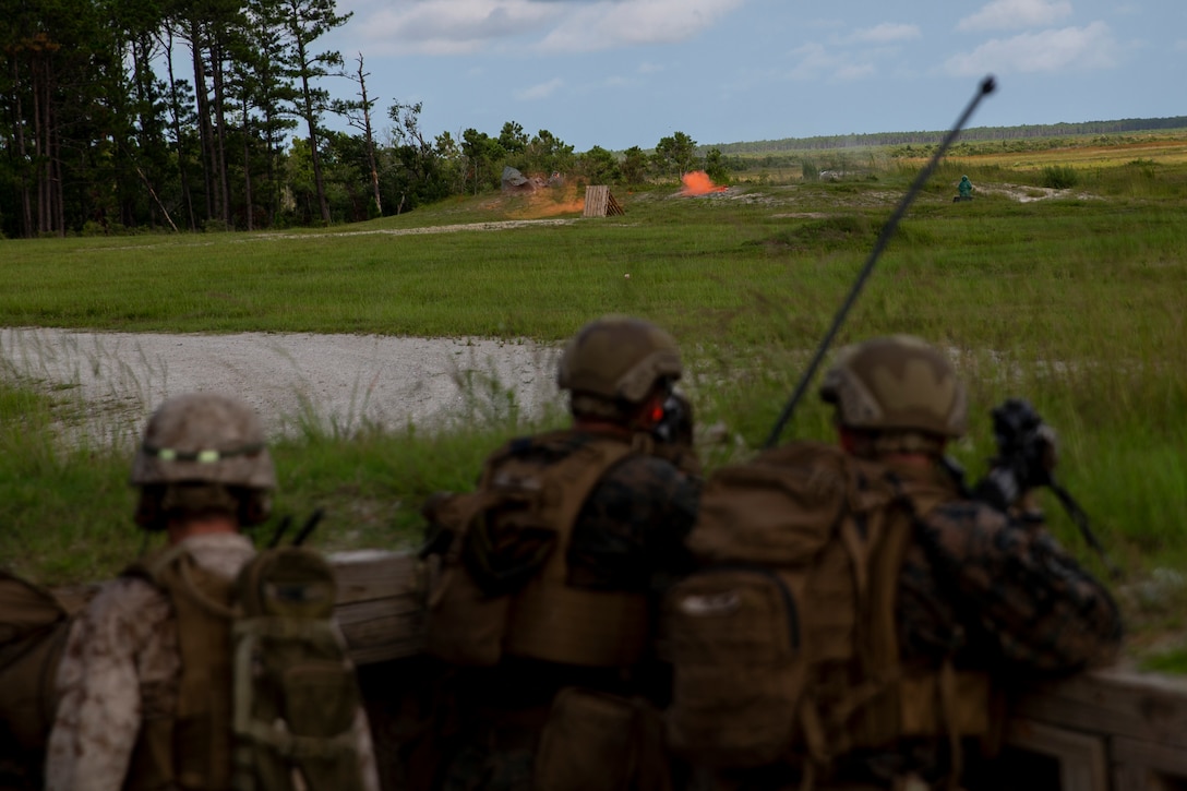 U.S. Marines with 2d Battalion, 6th Marine Regiment, 2d Marine Division, suppress simulated enemy fire during a range as part of a Marine Corps Combat Readiness Evaluation (MCCRE) at Camp Lejeune, N.C., July 27, 2021. A MCCRE is an exercise designed to formally evaluate a unit’s combat readiness and if successful, the unit will achieve apex status and is deemed ready for global employment. (U.S. Marine Corps photo by Pfc. Sarah Pysher)