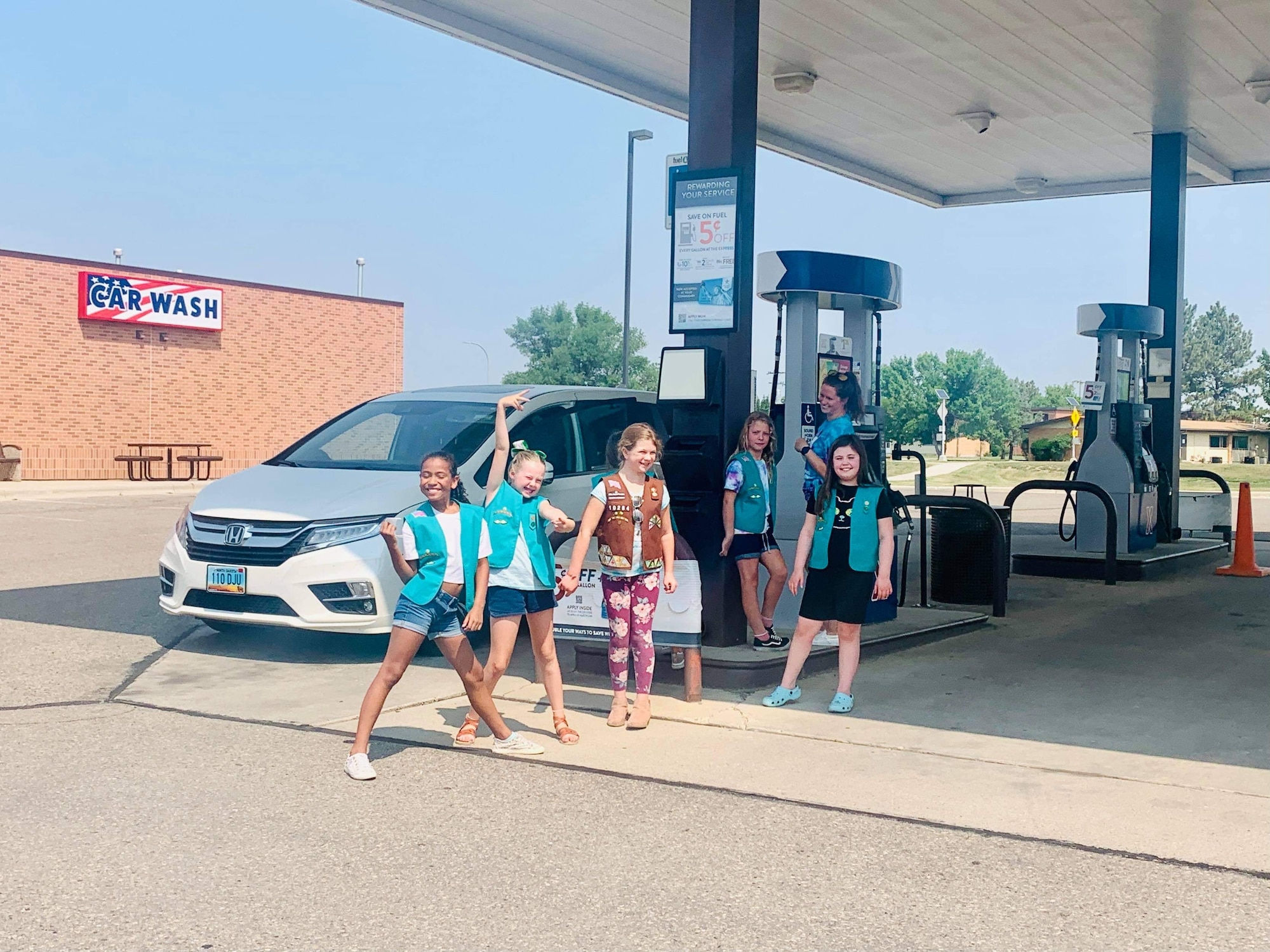 Girl Scouts are pictured above helping out at Minot Air Force Base, ND. Courtesy asset from Lucy Vest