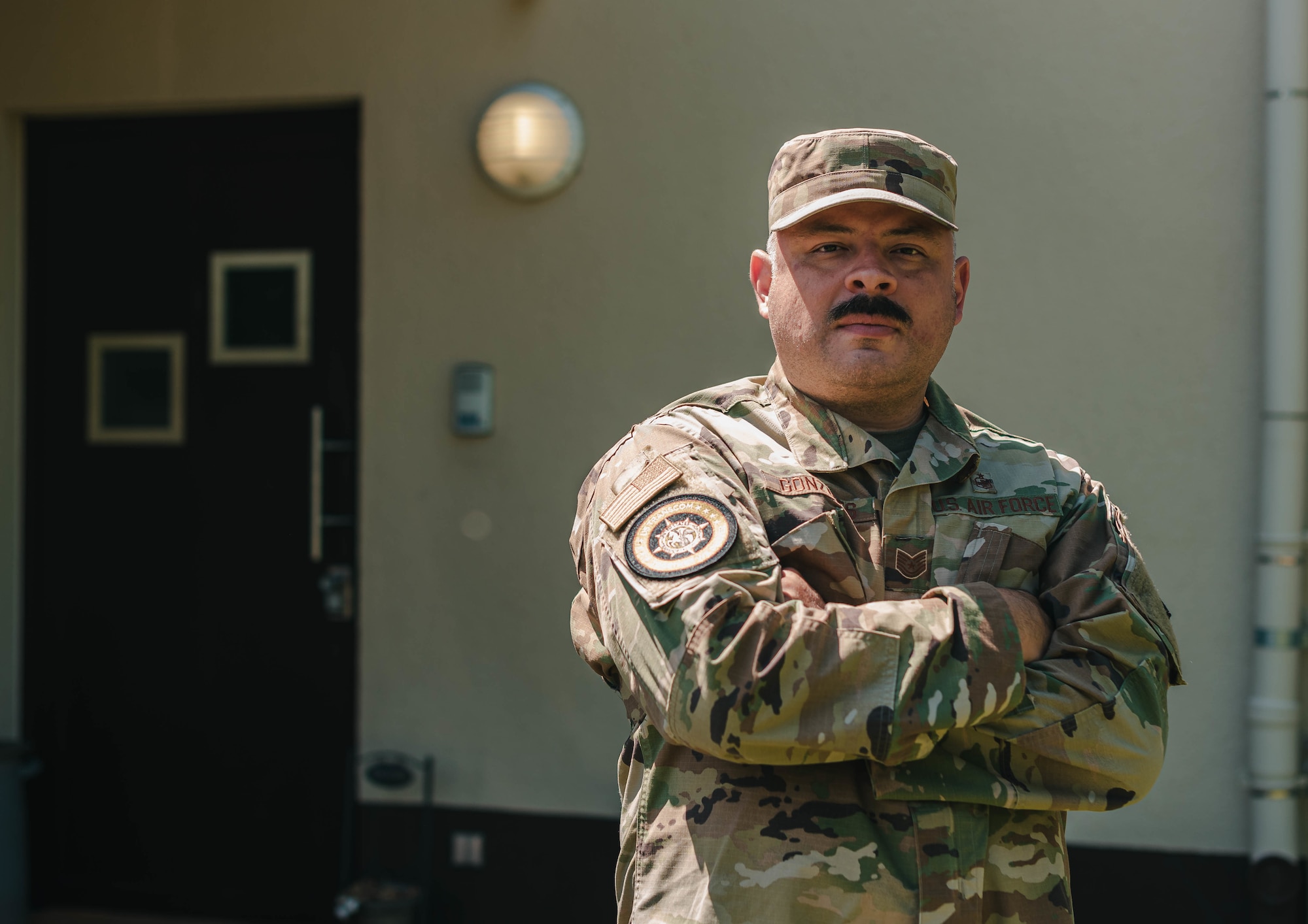 Airman stands for photo