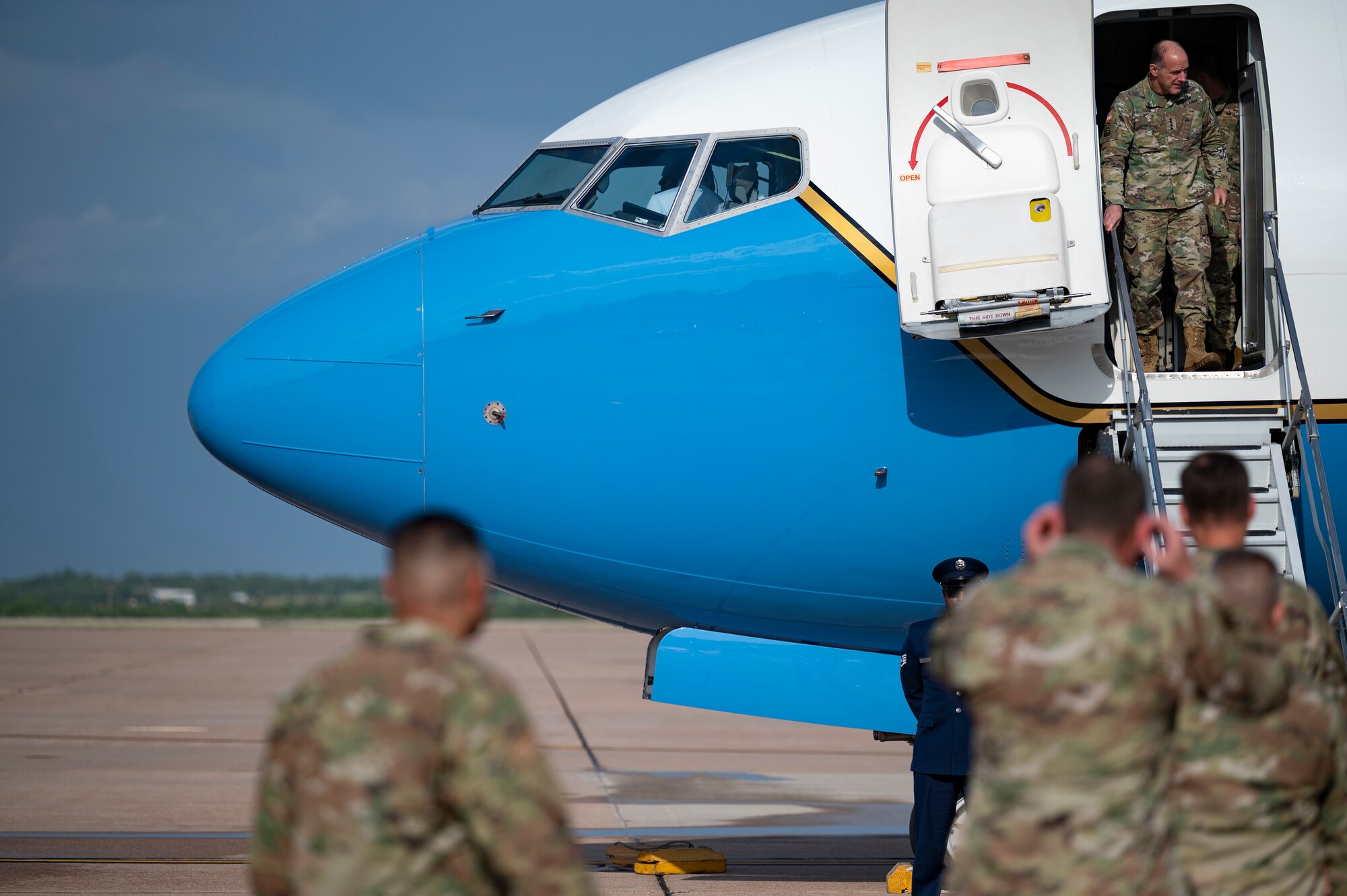 U.S. Army Gen. Stephen R. Lyons, U.S. Transportation Command commander, exits a Boeing C-40C at Dyess Air Force Base, Texas, July 28, 2021. Upon arrival, Lyons was greeted by the command teams of the 317th Airlift Wing and the 7th Bomb Wing before participating in a tour of the 39th Airlift Squadron. (U.S. Air Force photo by Senior Airman Colin Hollowell)