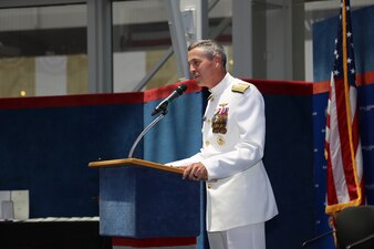 PENSACOLA, Fla. (July 30, 2021) Commander, Naval Education and Training Command, Rear Adm. Pete  Garvin, addresses the crowd at the Naval Education and Training Professional Development Center (NETPDC) change of command held at the National Aviation Museum onboard Naval Air Station Pensacola, July 30, 2021. Garvin commended NETPDC’s team on their contributions during a time of significant change under the leadership of Commanding Officer Capt. Brett St. George. (U.S. Navy photo by Cheryl Dengler)