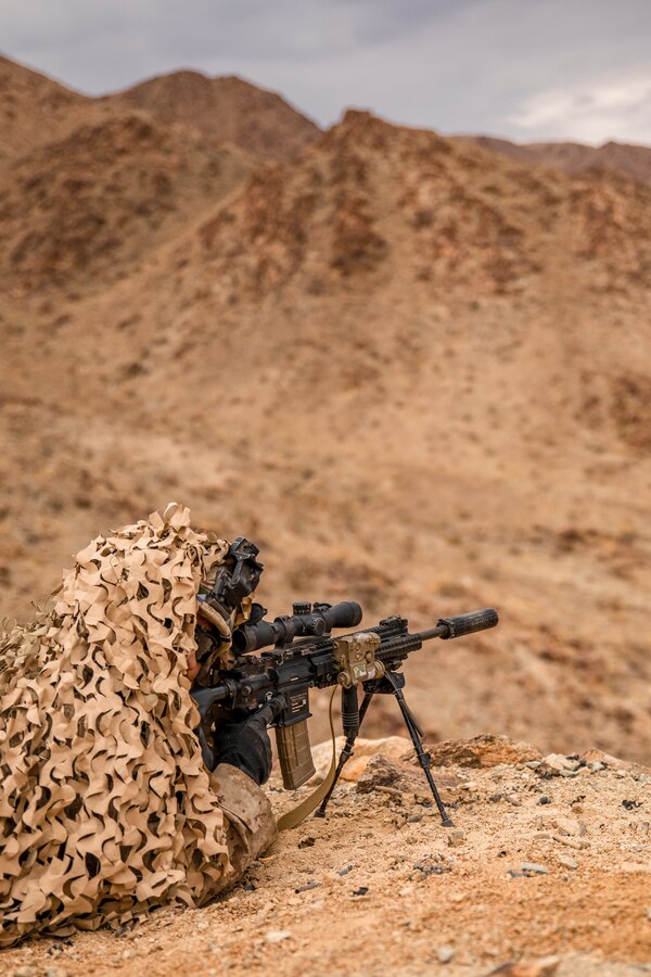 Lance Cpl. Louis Watterssmith, a designated marksman with Echo Company, 2nd Battalion, 23rd Marines, provides security on Range 410A during Integrated Training Exercise (ITX) 4-21 at Marine Corps Air Ground Combat Center, Twentynine Palms, California on July 30th, 2021. ITX is the culmination of Marine Forces Reserve units' training cycle as they participate in a live-fire, combined arms exercise as a part of an integrated Marine Air Ground Task Force. (U.S. Marine Corps photo by Sgt. JVonnta Taylor)