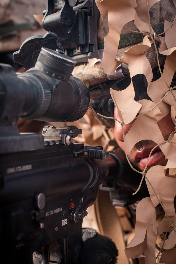 Lance Cpl. Louis Watterssmith, a designated marksman with Echo Company, 2nd Battalion, 23rd Marines, provides covering fire on Range 410A during Integrated Training Exercise (ITX) 4-21 at Marine Corps Air Ground Combat Center, Twentynine Palms, California on July 30th, 2021. Range 410A provides Reserve Marines the opportunity to execute a fire and maneuver attack supported by mortarmen, machine gunners and combat engineers. (U.S Marine Corps photo by Lance Cpl. David Intriago)