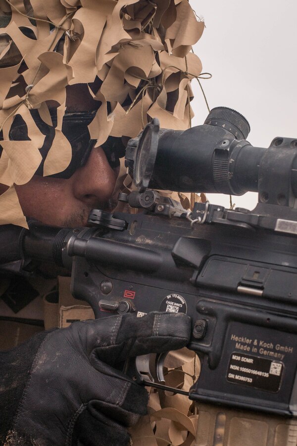 Lance Cpl. Louis Watterssmith, a designated marksman with Echo Company, 2nd Battalion, 23rd Marines, provides covering fire on Range 410A during Integrated Training Exercise (ITX) 4-21 at Marine Corps Air Ground Combat Center, Twentynine Palms, California on July 30th, 2021. Range 410A provides Reserve Marines the opportunity to execute a fire and maneuver attack supported by mortarmen, machine gunners and combat engineers. (U.S Marine Corps photo by Lance Cpl. David Intriago)