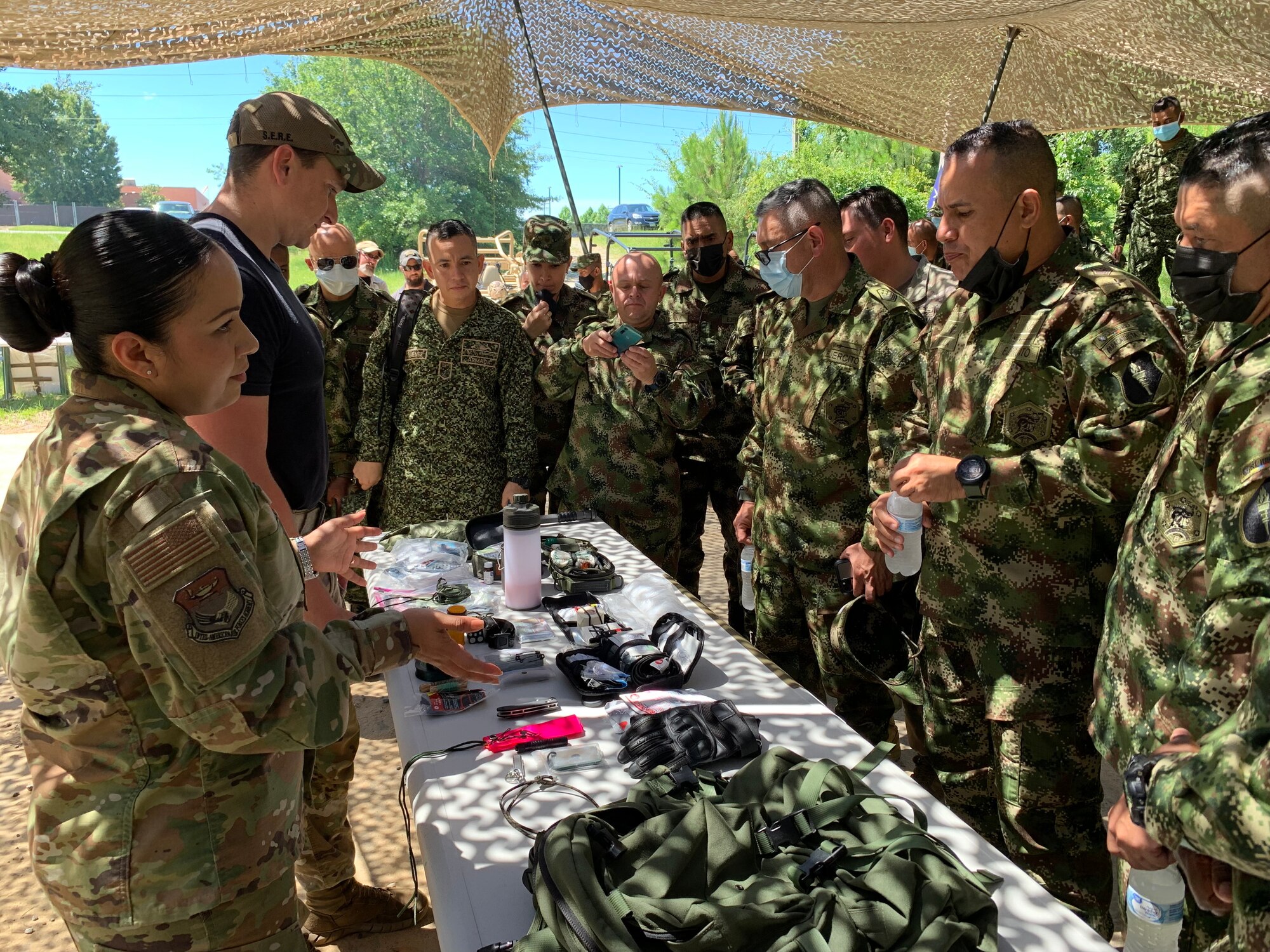 Air Force technical sergeant translates during a survival briefing.