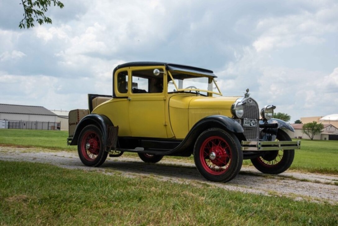 A 1929 Ford Model A is parked on a side road July 20, 2021, At McConnell Air Force Base, Kansas. Tech. Sgt. Joshua Schmitz, 22nd Operational Support Squadron, survival evasion resistance escape specialist, spends his free time, maintaining his automobile and providing the local community the opportunity to see his antique vehicle. (U.S. Air Force photo by Airman 1st Class Zachary Willis)