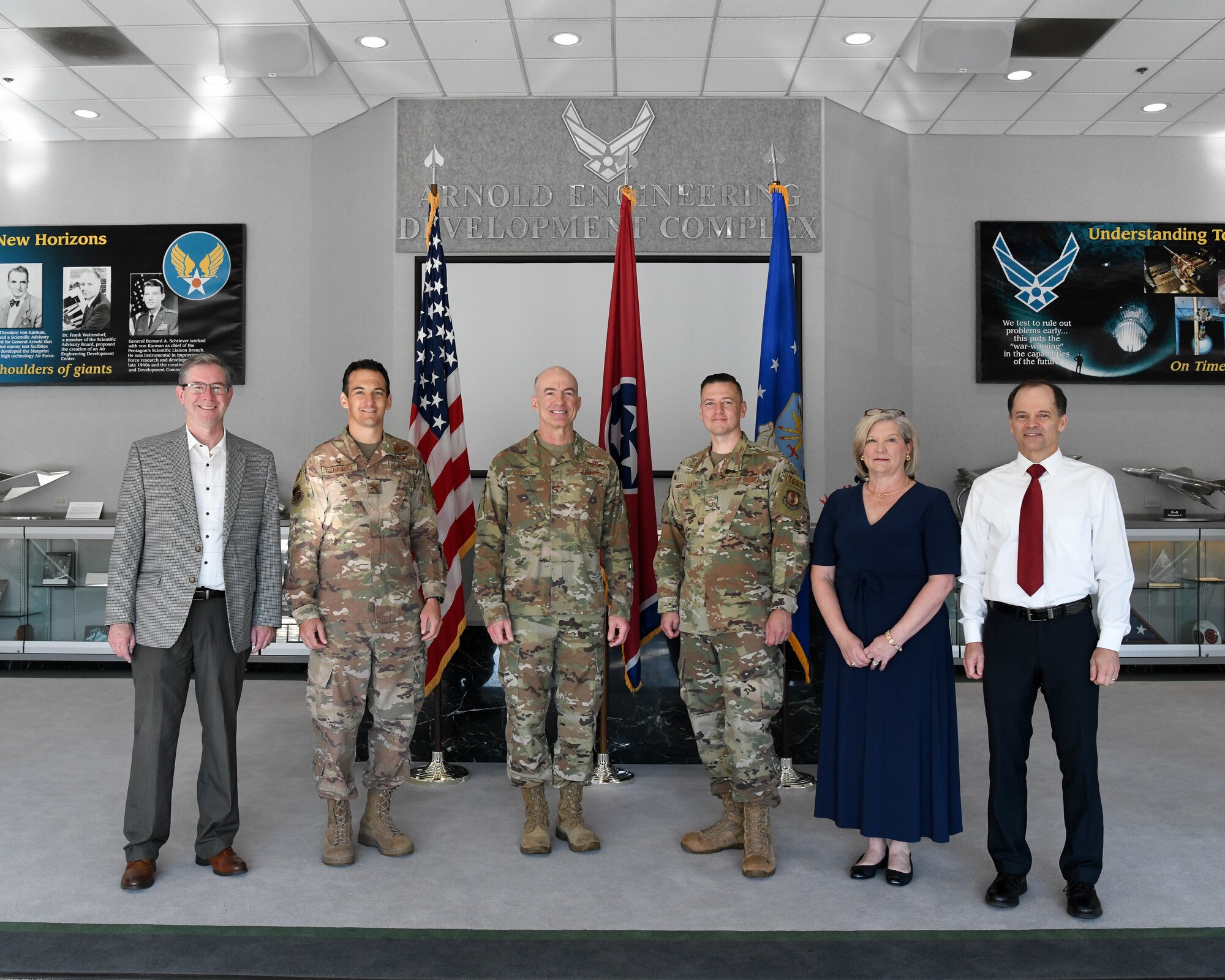 Maj. Gen. Christopher Azzano, third from left, commander, Air Force Test Center, pauses for a photo with Arnold Engineering Development Complex leadership during his farewell visit to Arnold Air Force Base, Tenn., June 30, 2021. Pictured left to right are: Jason Coker, AEDC vice-director; Col. Jeffrey Geraghty, AEDC commander; Azzano; Senior Master Sgt. Jason Harlan, interim superintendent; Sarah Beth Morgan, Complex support chief; and Ed Tucker, senior technical director. (U.S. Air Force photo by Jill Pickett)