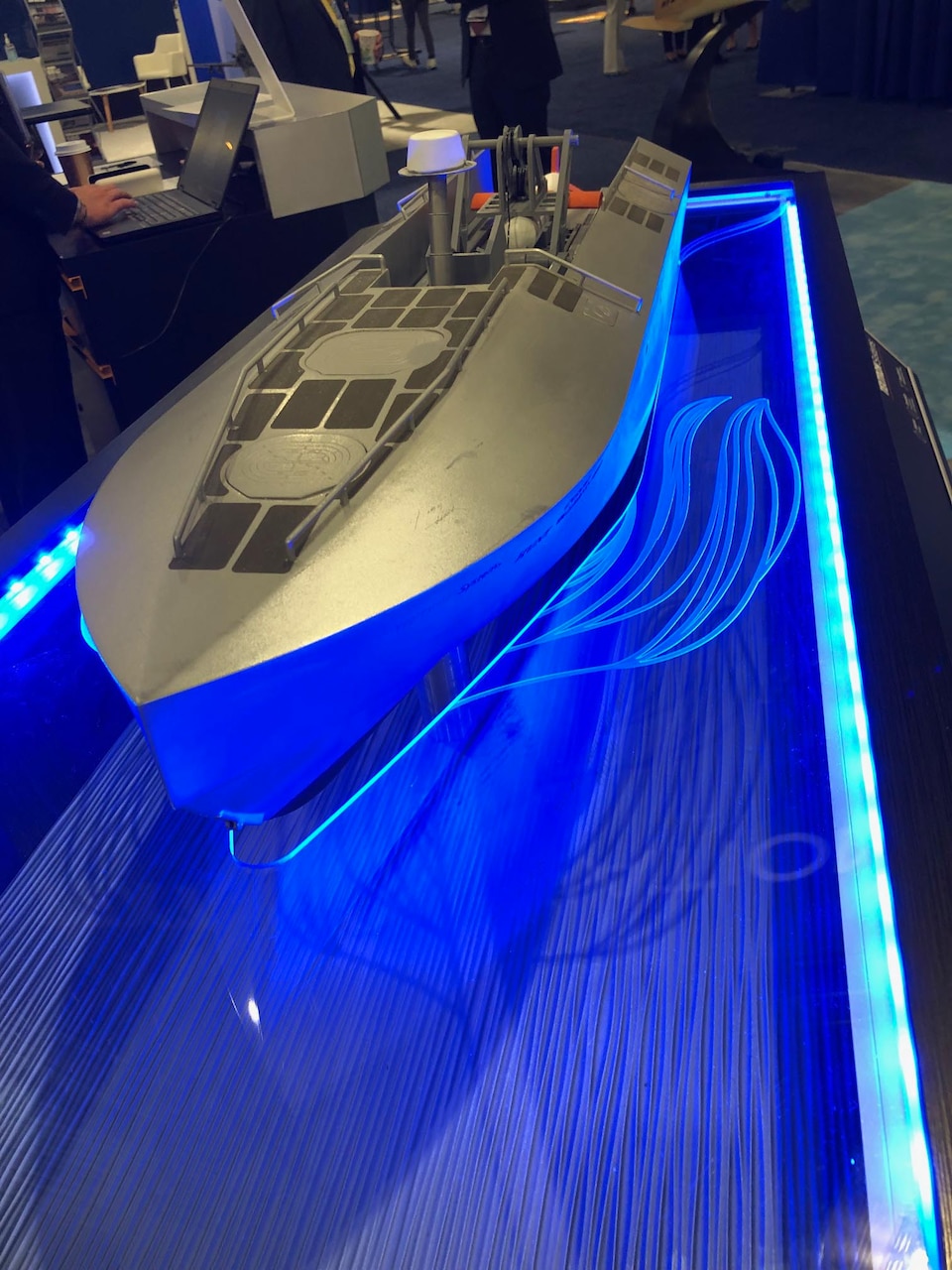 An advanced weapon is shown on display.