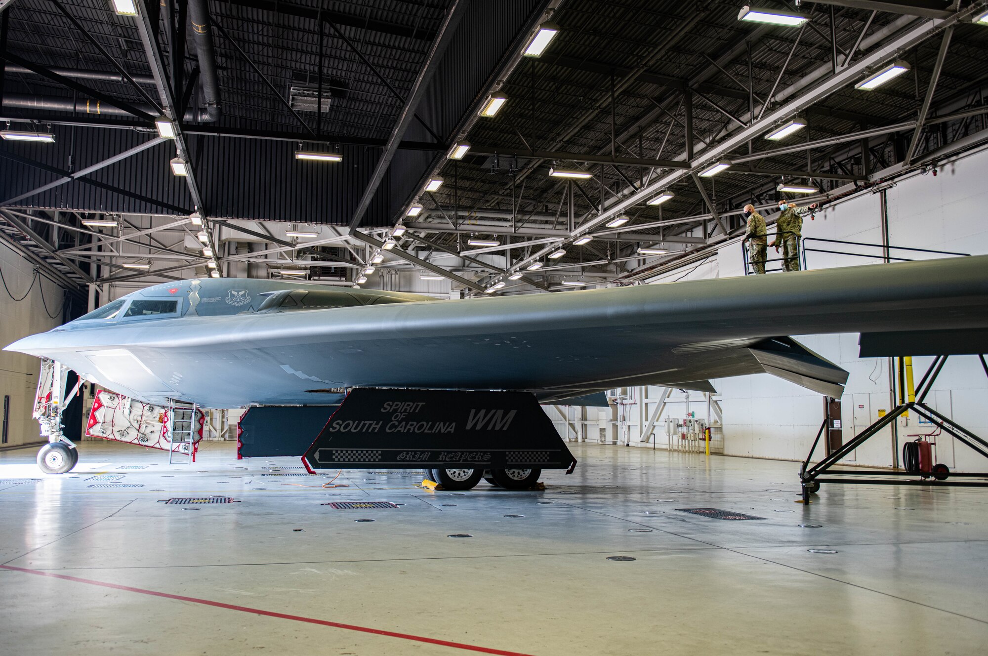 U.S. Air Force Col. David Kelley, Air Force Global Strike Command chaplain and Chief Master Sgt. Steven Beasley, Air Force Global Strike Command religious affairs senior enlisted leader, tours the B-2 Spirit at Whiteman Air Force Base, Missouri, July 27, 2021. Kelley and Beasley toured the work centers at Whiteman in order to gather a better idea of Airmen culture.