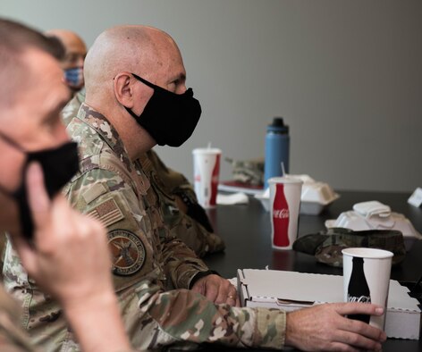 U.S. Air Force Col. David Kelley, Air Force Global Strike Command chaplain, and Chief Master Sgt. Steven Beasley, Air Force Global Strike Command religious affairs senior enlisted leader, has lunch with senior leaders at Whiteman Air Force Base, Missouri, July 27, 2021. Kelley and Beasley met 20 senior NCOs assigned to Whiteman for a resiliency lunch and discussion.