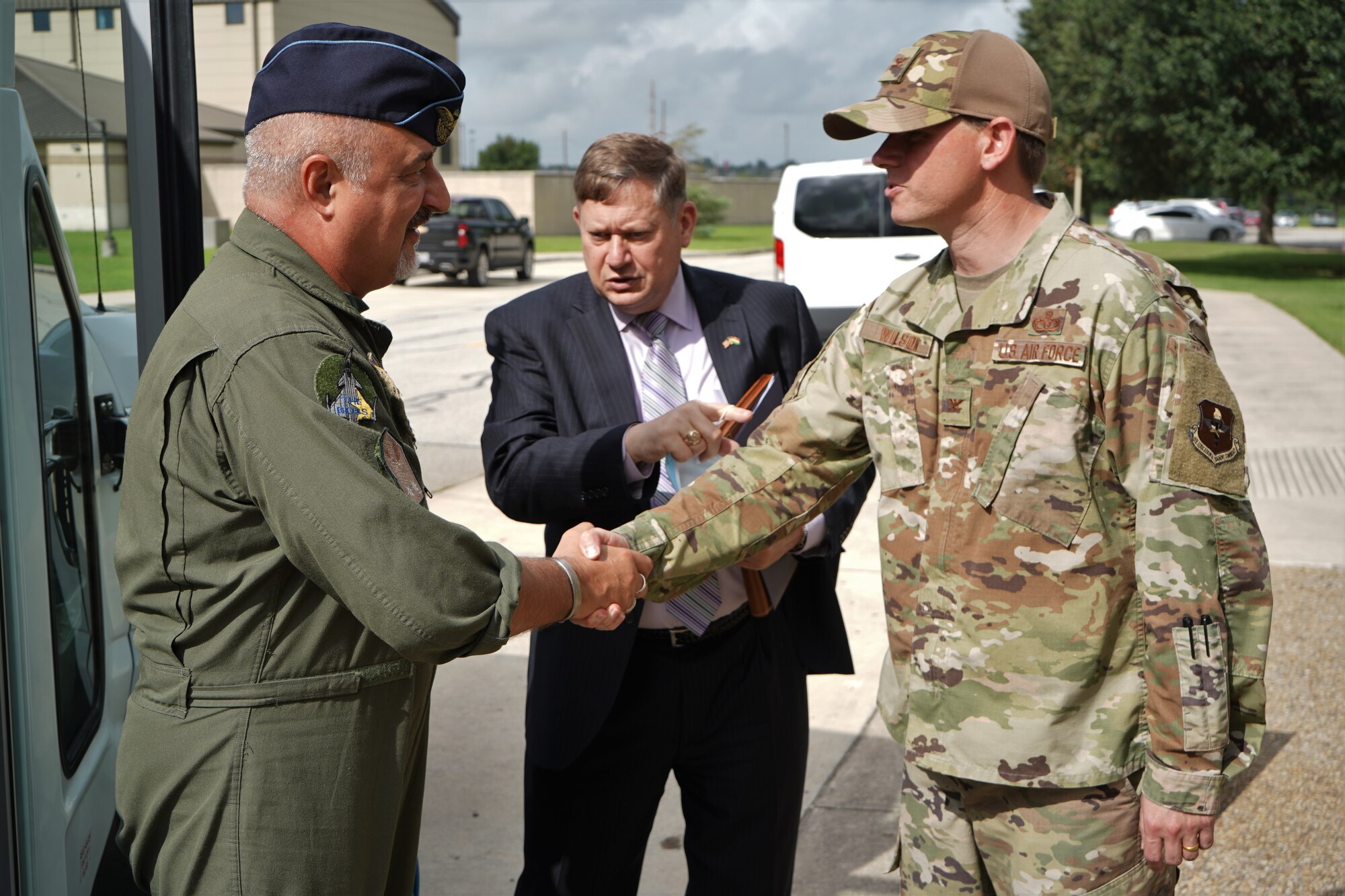 Col. Wilson shakes hands with Hungarian Air Chief at DLIELC.