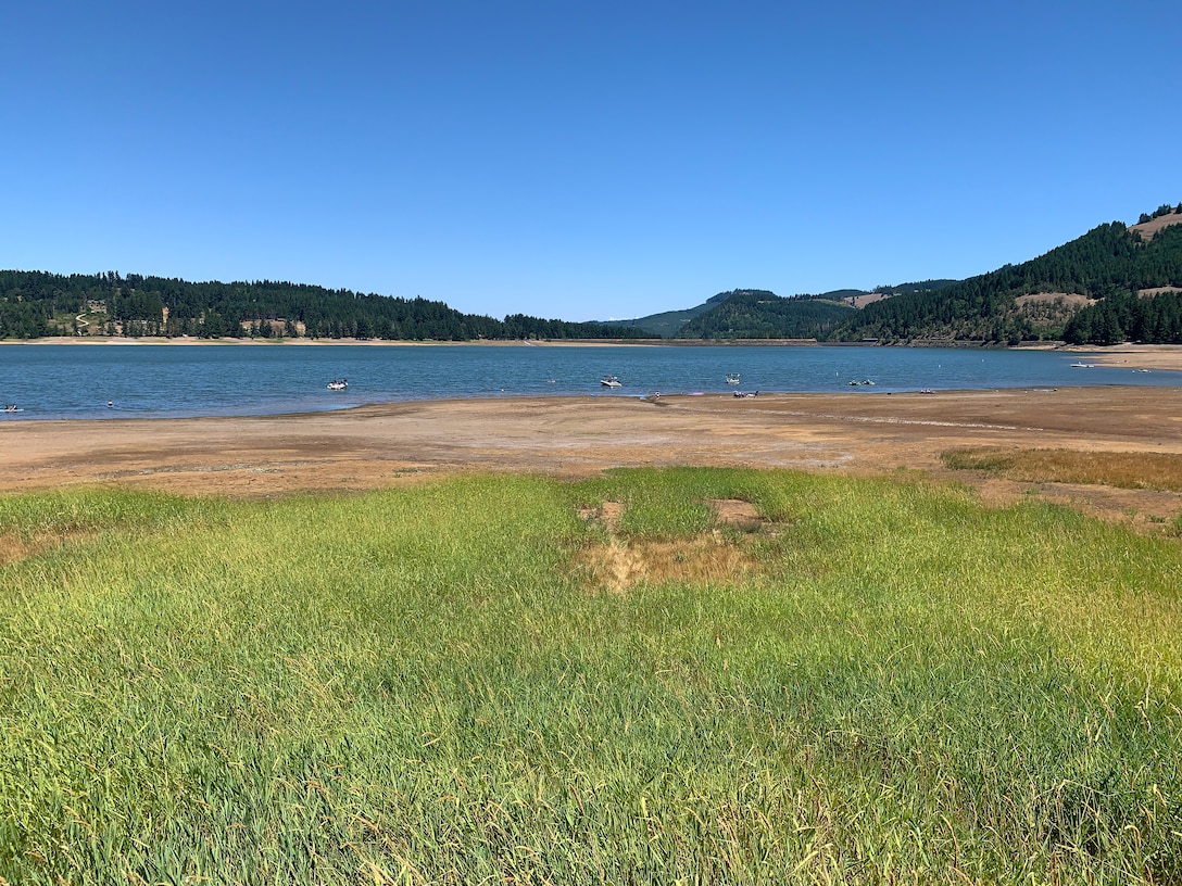 Cottage Grove Reservoir is 24% full, which is 76% less than what it should be as of Aug. 2, 2021 (photo taken July 20).

Nearly 50 days without measurable rain, combined with hot, dry conditions, has made reservoir levels in the Willamette Valley the lowest in six years. Additionally, forecasts are not predicting enough precipitation to alleviate the ongoing drought in the Pacific Northwest.