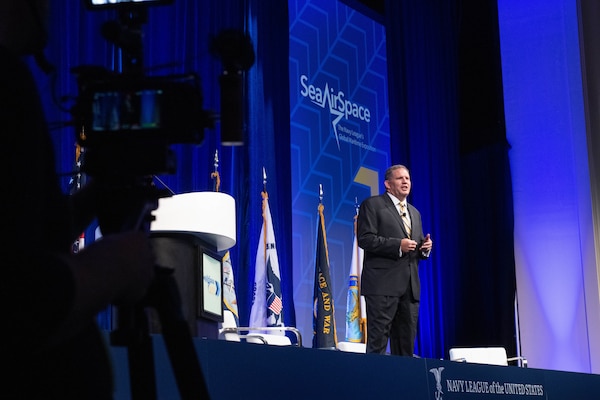The Honorable James F. Geurts, Undersecretary of the Navy, talks as a keynote speaker during the opening ceremony the Sea-Air-Space Exposition.
