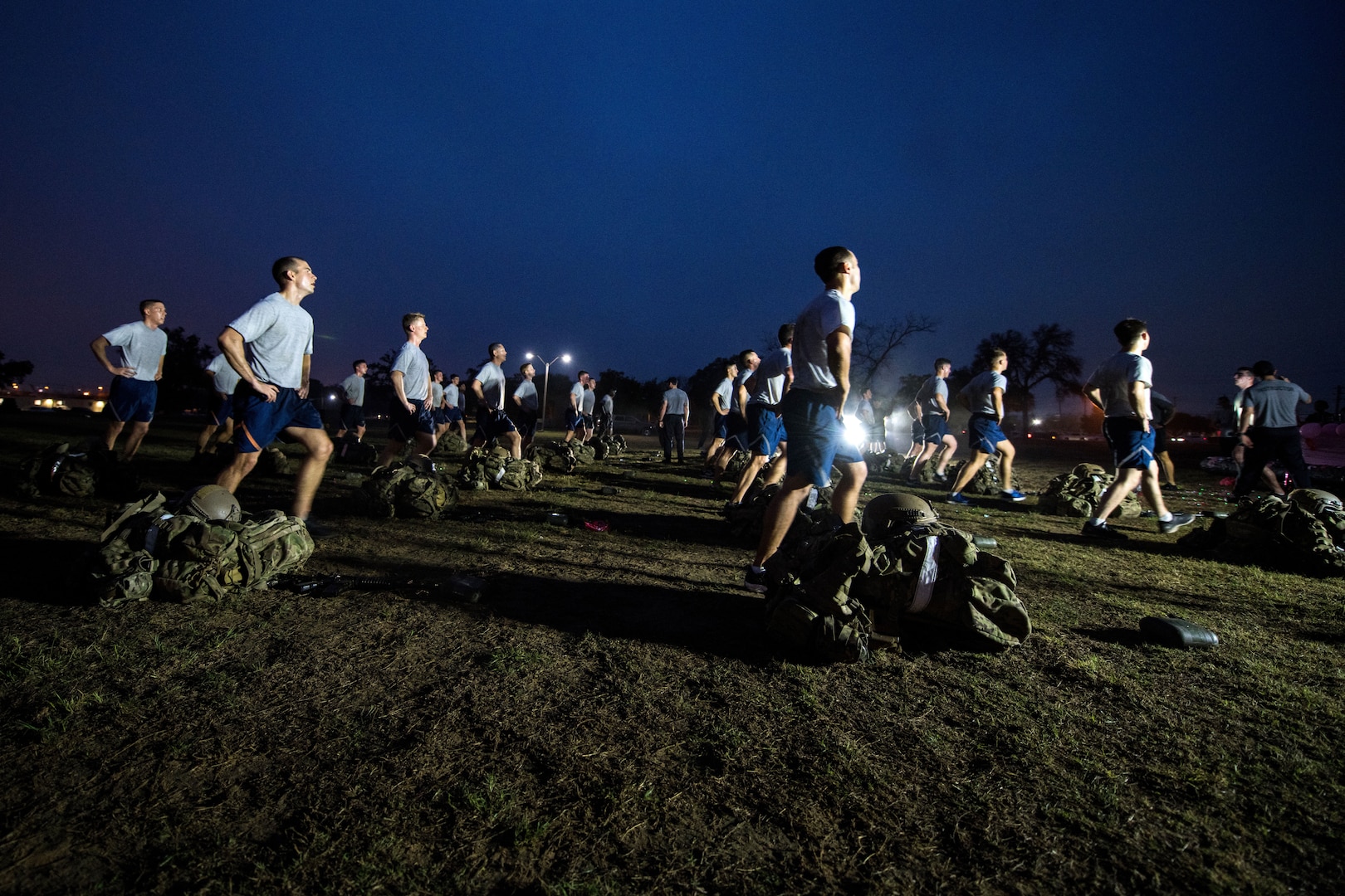 Tactical Air Control Party (TACP) instructors with the 353rd Special Warfare Training Squadron conduct physical training drills with trainees during the TACP apprentice course, Jan. 14, 2020, at Joint Base San Antonio-Chapman Annex, Texas.