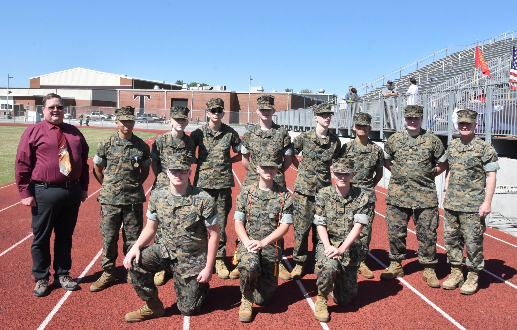 Members of this year’s Tullahoma High School Marine Corps Junior ROTC CyberPatriot program are pictured with Arnold Engineering Development Complex senior engineer, Technical Management, Michael Glennon, left, who serves as program mentor, and Col. Jeffrey Johnson, U.S. Marine Corps (Ret.), right, who serves as THS CyberPatriot coach. The team members pictured back row from left are: Julian Taylor, Jaydon Lee, Ethan Simmons, Kaden Baker, Mason LeMay, Anthony Lelez and John Young. Pictured front row from left are: Deekan Wilson, Zachary Wirth (team captain) and Gavin Jones. (U.S. Air Force photo by Bradley Hicks)