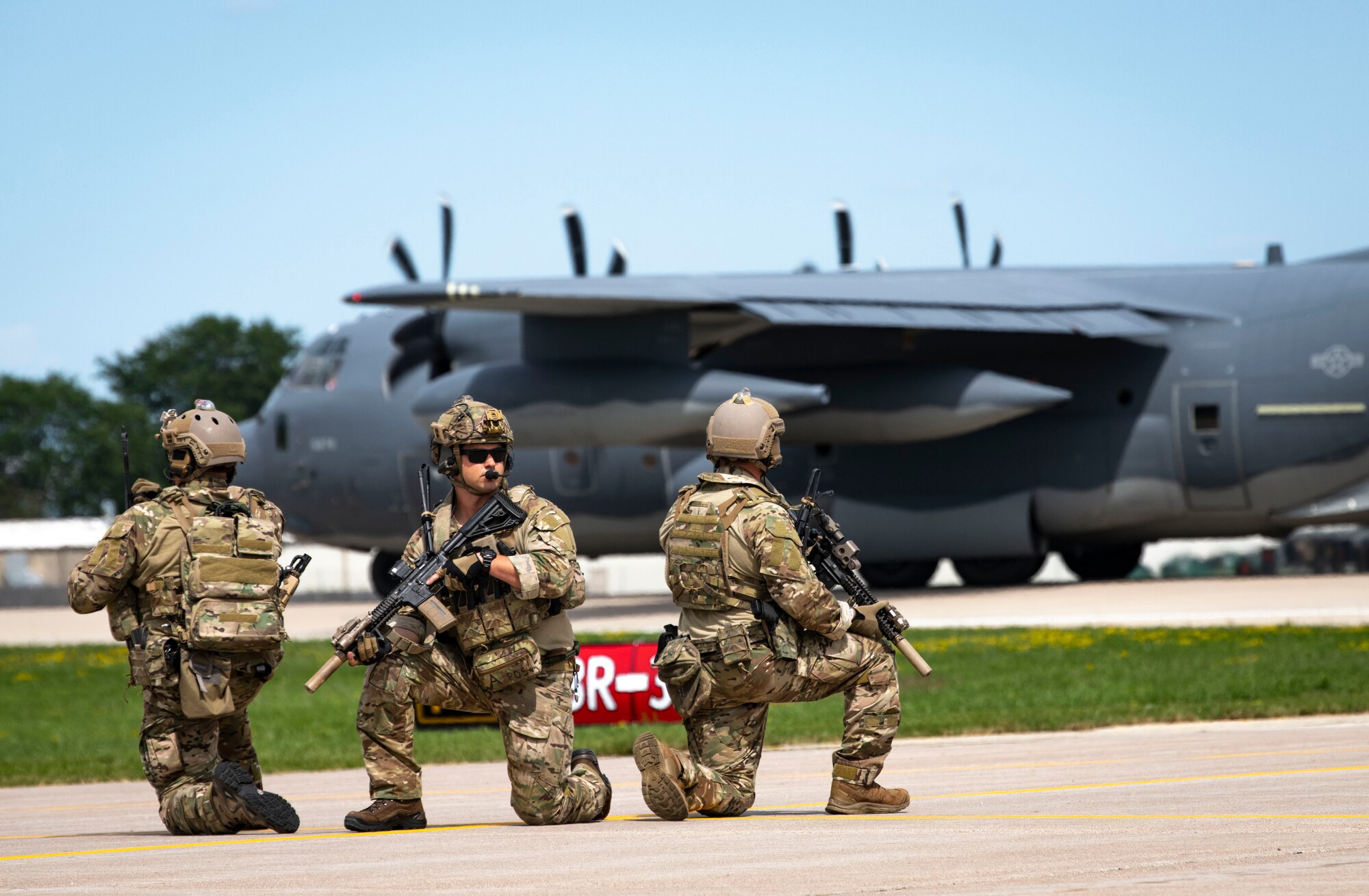U.S. Air Force special tactics Airmen with the Air Force Special Operations Command provide security during a personnel recovery demonstration at Wittman Regional Airport, Wis., July 30, 2021.