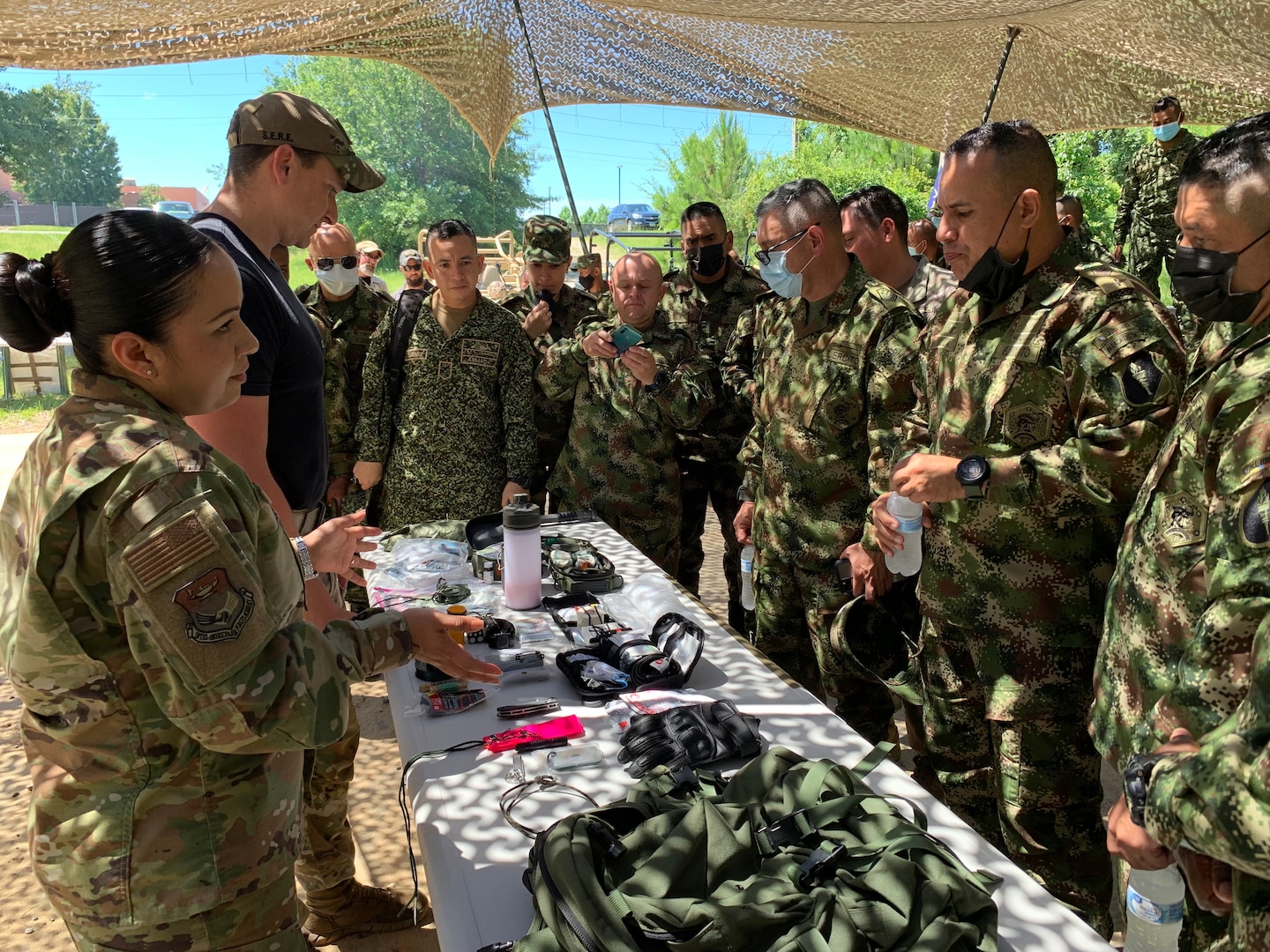 Air Force technical sergeant translates during a survival briefing.