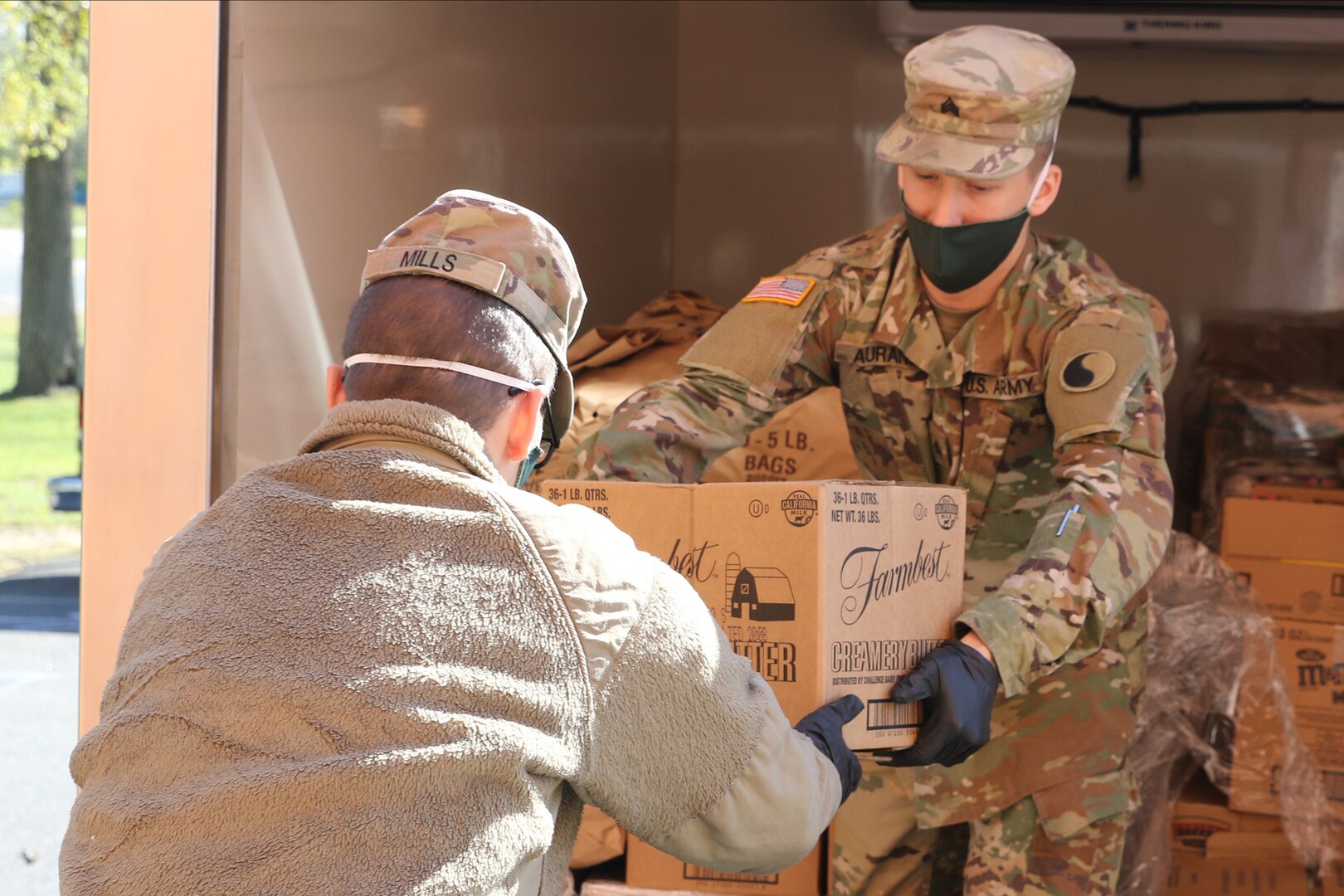 Virginia National Guard Soldiers assigned to the Fredericksburg-based 229th Brigade Engineer Battalion, 116th Infantry Brigade Combat Team, help deliver food from the Fredericksburg Regional Food Bank to the food pantry at Massaponax Baptist Church April 22, 2020, in Fredericksburg, Virginia.
