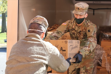 Virginia National Guard Soldiers assigned to the Fredericksburg-based 229th Brigade Engineer Battalion, 116th Infantry Brigade Combat Team, help deliver food from the Fredericksburg Regional Food Bank to the food pantry at Massaponax Baptist Church April 22, 2020, in Fredericksburg, Virginia.