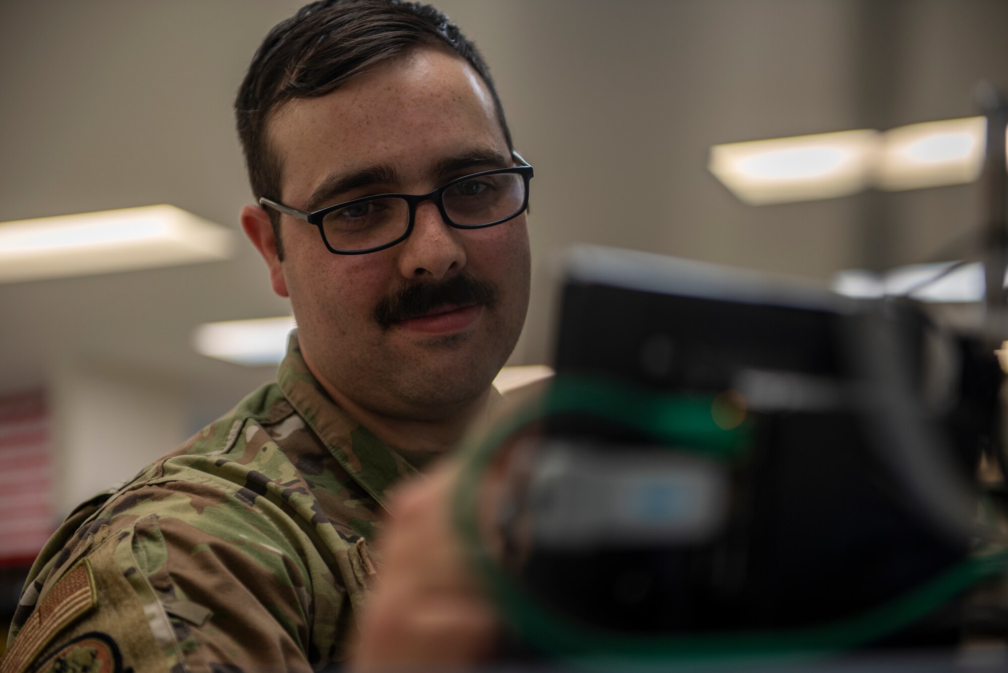 The 379th EMXS Precision Measurement Equipment Laboratory compiles the data in a monthly report to ensure the lab is at a constant temperature of 73 degrees Fahrenheit, plus or minus 6 degrees, and between 20-50% relative humidity to maintain consistent testing conditions. (U.S. Air Force photo by Airman 1st Class Kylie Barrow)