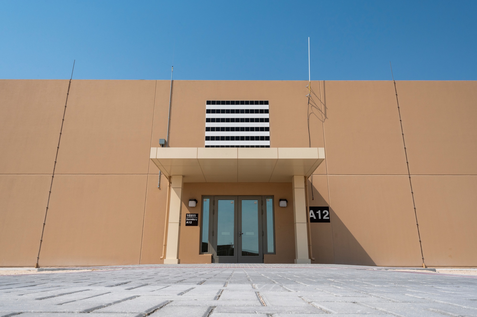 A ribbon cutting ceremony was held in one of two new Blatchford-Preston Complex dormitories to celebrate the completion of the buildings Aug. 3, 2021, at Al Udeid Air Base, Qatar.