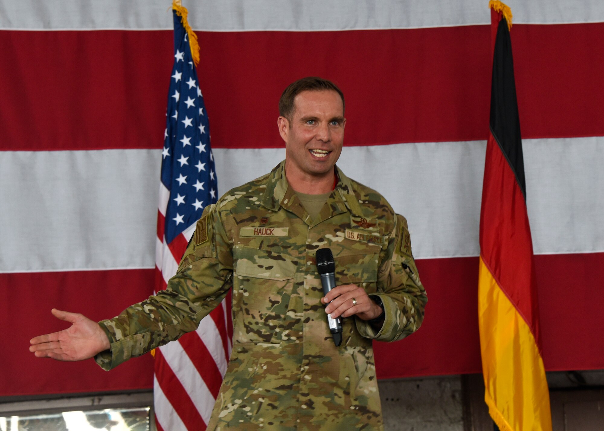 U.S. Air Force Col. Leslie Hauck, 52nd Fighter Wing commander, discusses his priorities of airmen, mission and community during an all call on Spangdahlem Air Base, Germany, July 30, 2021.
