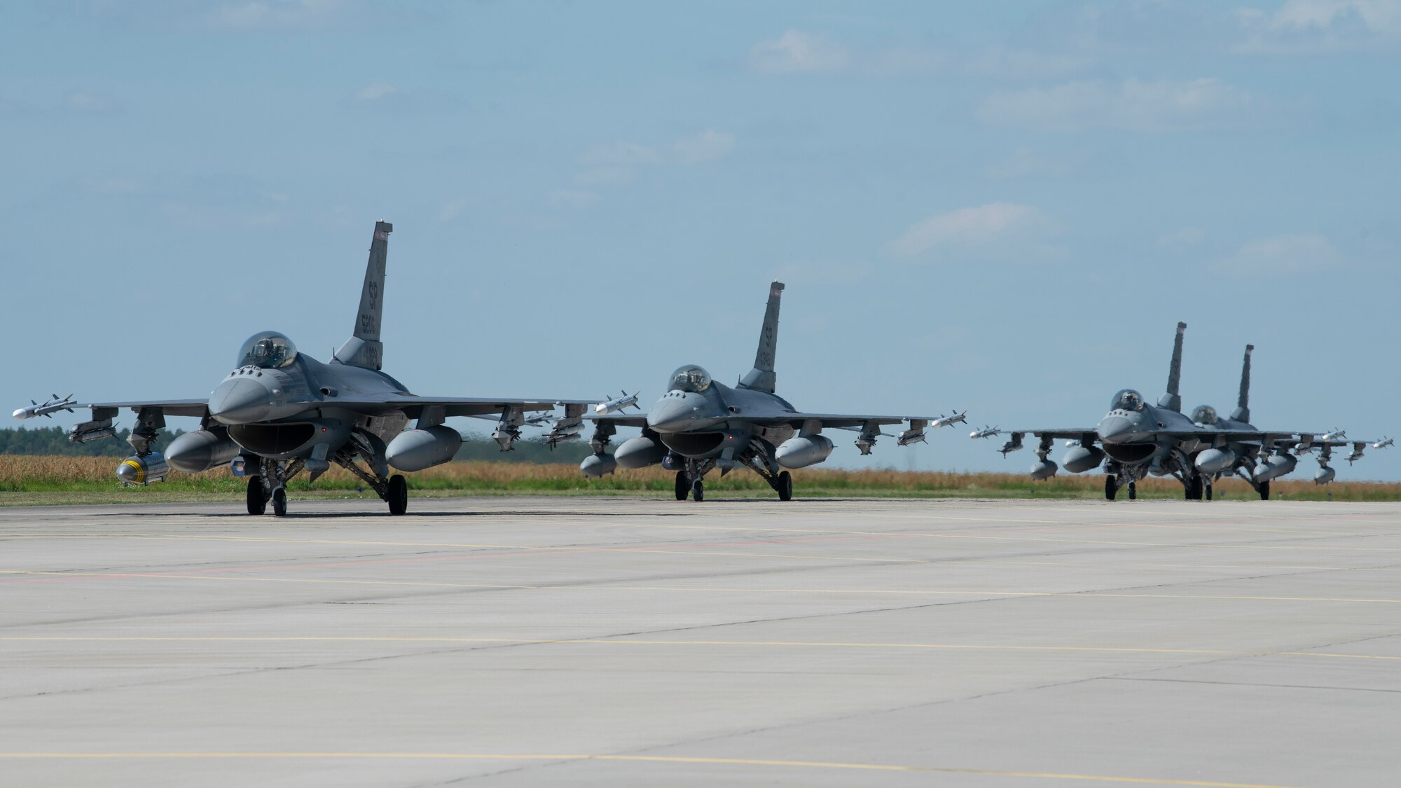Four F-16 Fighting Falcon aircraft assigned to the 480th Fighter Squadron, 52nd Fighter Wing, Spangdahlem Air Base, Germany, arrive at the 32nd Tactical Air Base, Łask Air Base, Poland July 30, 2021, to participate in Aviation Detachment Rotation 21.3. The exercise is a bilateral training exercise with the Polish to enhance partner interoperability, maintain joint readiness and assure our regional allies. (U.S. Air Force photo by Tech. Sgt. Anthony Plyler)
